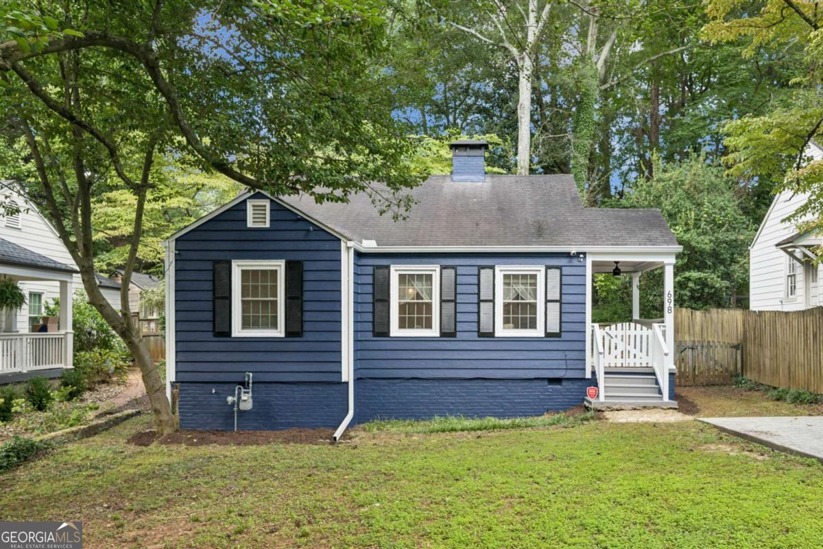 This charming storybook cottage in historic Avondale Estates offers a perfect blend of comfort and tranquility. Located just steps from local shops and restaurants in downtown Avondale, it sits on a peaceful, short street with no through traffic. The spacious lot features a picturesque backyard that feels straight out of a fairytale. The home has been thoughtfully updated with a modern kitchen and bathroom, and includes 2 bedrooms, a laundry closet, dining room, living room, and two inviting porches. Part of the yard is fenced for your privacy and security, while the rest remains a beautiful natural retreat. Conveniently close to Downtown Decatur, Marta, I-285, CDC, Emory, and more, this property offers both charm and accessibility.
