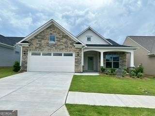 This Martin Ray is a vibrant new construction single family home located in Del Webb Chateau Elan!! This 2 bed/ 2 full bath home has it all. There's plenty of space to entertain in the gathering room or cook in this bright and beautiful eat in kitchen. The large island provides breakfast seating and overlooks an extended Gathering Room with rich hardwoods & a cozy fireplace. This home also offers an amazing sunroom to relax and enjoy all day. Easy access to 85 and 985, medical facility, grocery shopping and retail therapy all within 15 minutes from the community.