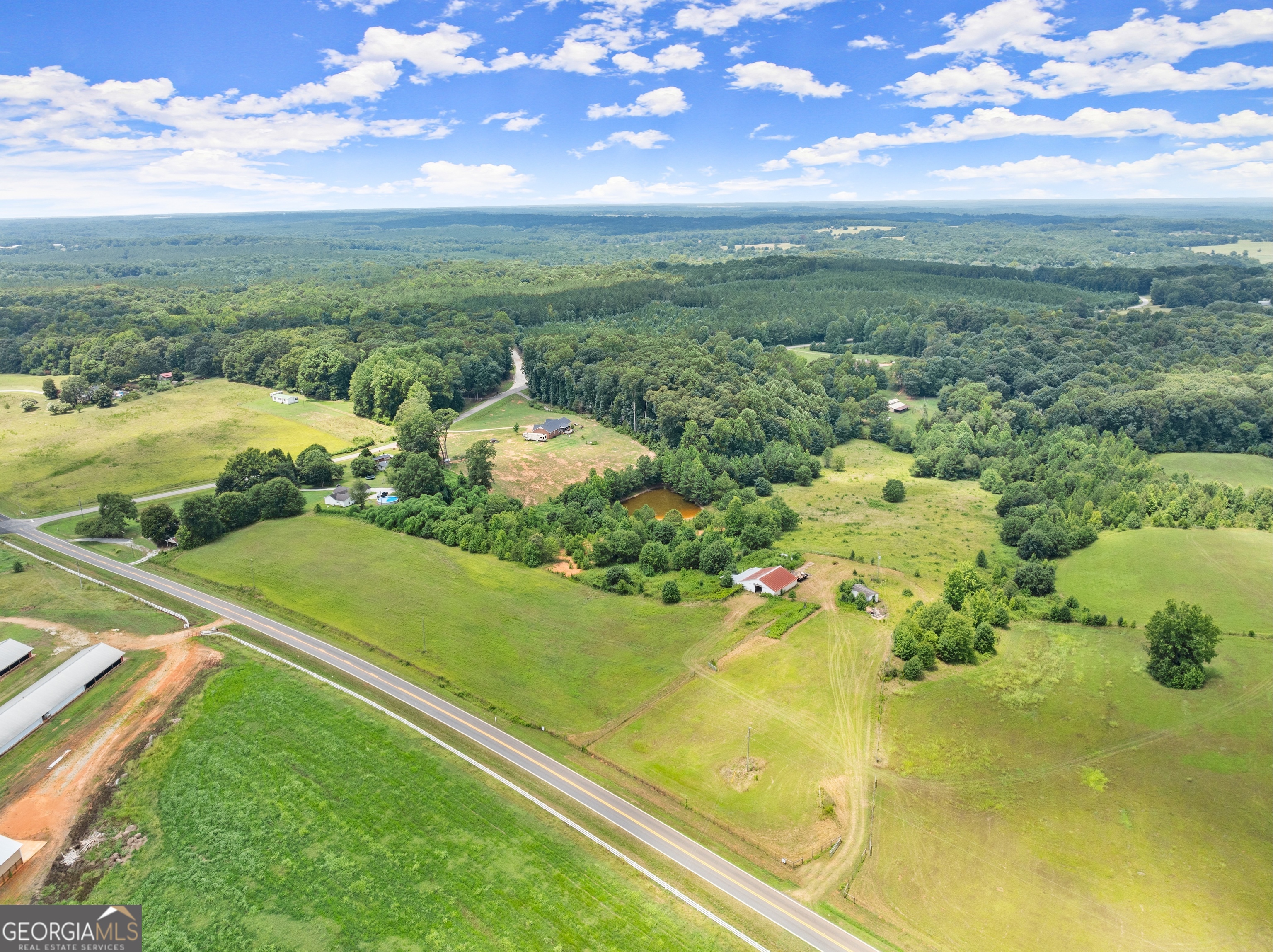 Spanning over 4.86 acres of beautifully maintained pasture, this property features a four-stall barn-perfect for you to bring your animals. It already includes a well, electricity, and a septic tank, ready for you to build your dream home. Enjoy peaceful country living just minutes from town, schools, shopping, and dining, with easy access to I-85 for added convenience.