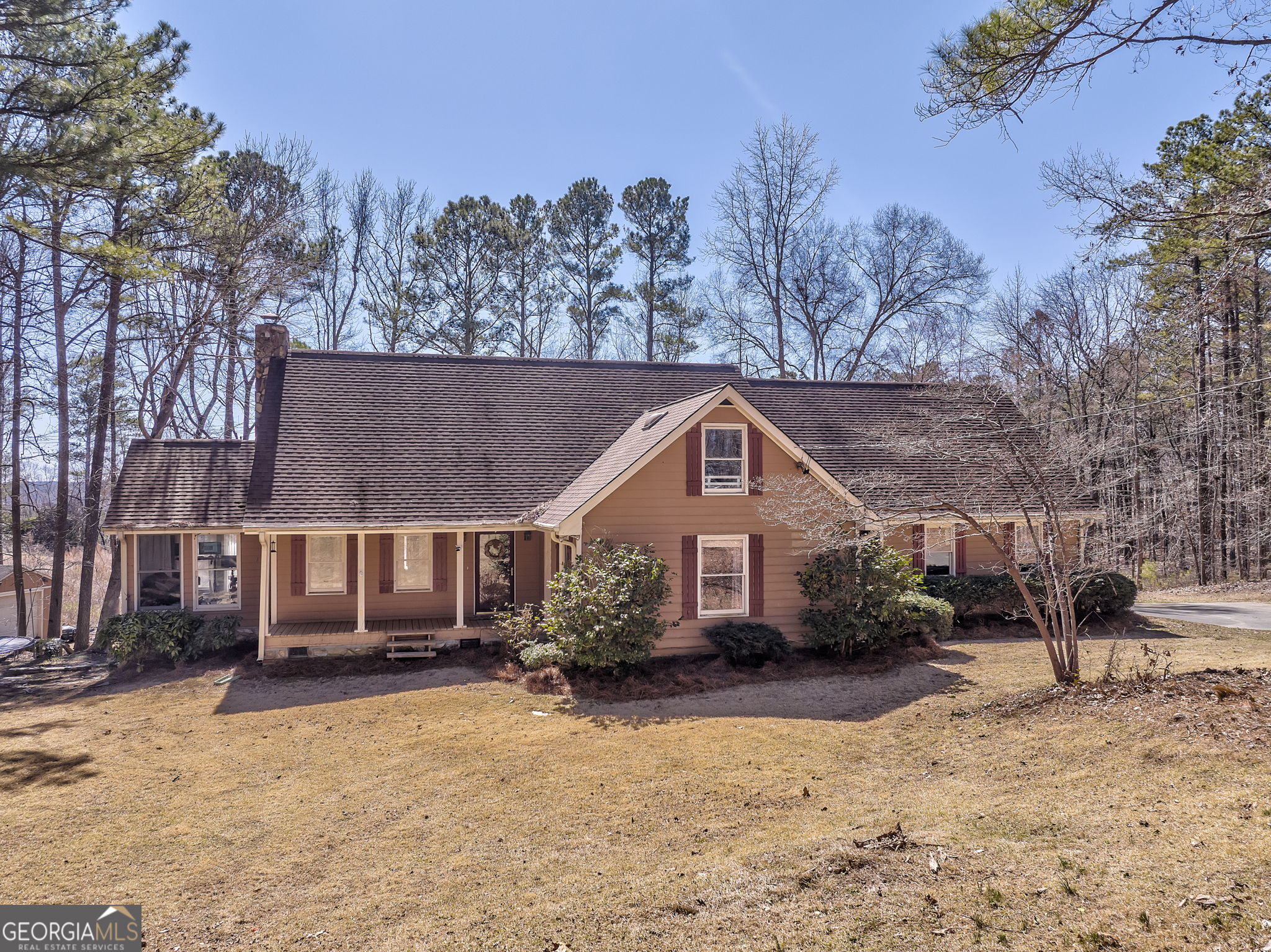 A rare find nestled in North Paulding on a peaceful country road with a vast amount of road frontage and an inviting horseshoe shaped driveway. If you're looking for an abundance of space, this home is for you. This beauty has 4 large bedrooms with the master on the main, a bonus room, and a loft. You will fall in love with the recently updated kitchen loaded with upgrades such as, stainless steel appliances, granite countertops, beautiful cabinetry, and an oversized island with seating. This home has additional features that include new flooring on the main level, a large walk-in pantry, a wood burning stove in the kitchen and a fireplace in the cozy family room, as well as a bright and relaxing sunroom, plenty of outdoor storage with the additional shed/storage building. The outdoor living is just as impressive offering a huge back deck overlooking this gorgeous property, the perfect place to entertain or relax in the hot tub. There is also a fully functional pasture that's completely fenced in and ready for a mini farm of your own, as well as a beautiful chicken coop and a raised garden. Situated in a quiet rural area but within minutes of the heart of downtown Dallas and Cartersville.