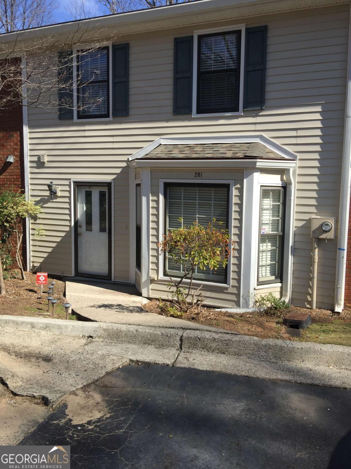 Renovated townhome in a most desirable Marietta area. This Townhome features a roommate plan with 2 bedrooms and 2 bathrooms on the top level. New hardwoods throughout the entire home. The kitchen has new appliances and a new countertop. There are skylights in both bathrooms. This home is ready for immediate occupancy. The large deck goes onto a very nice green space. Washer and dryer will remain with the property.