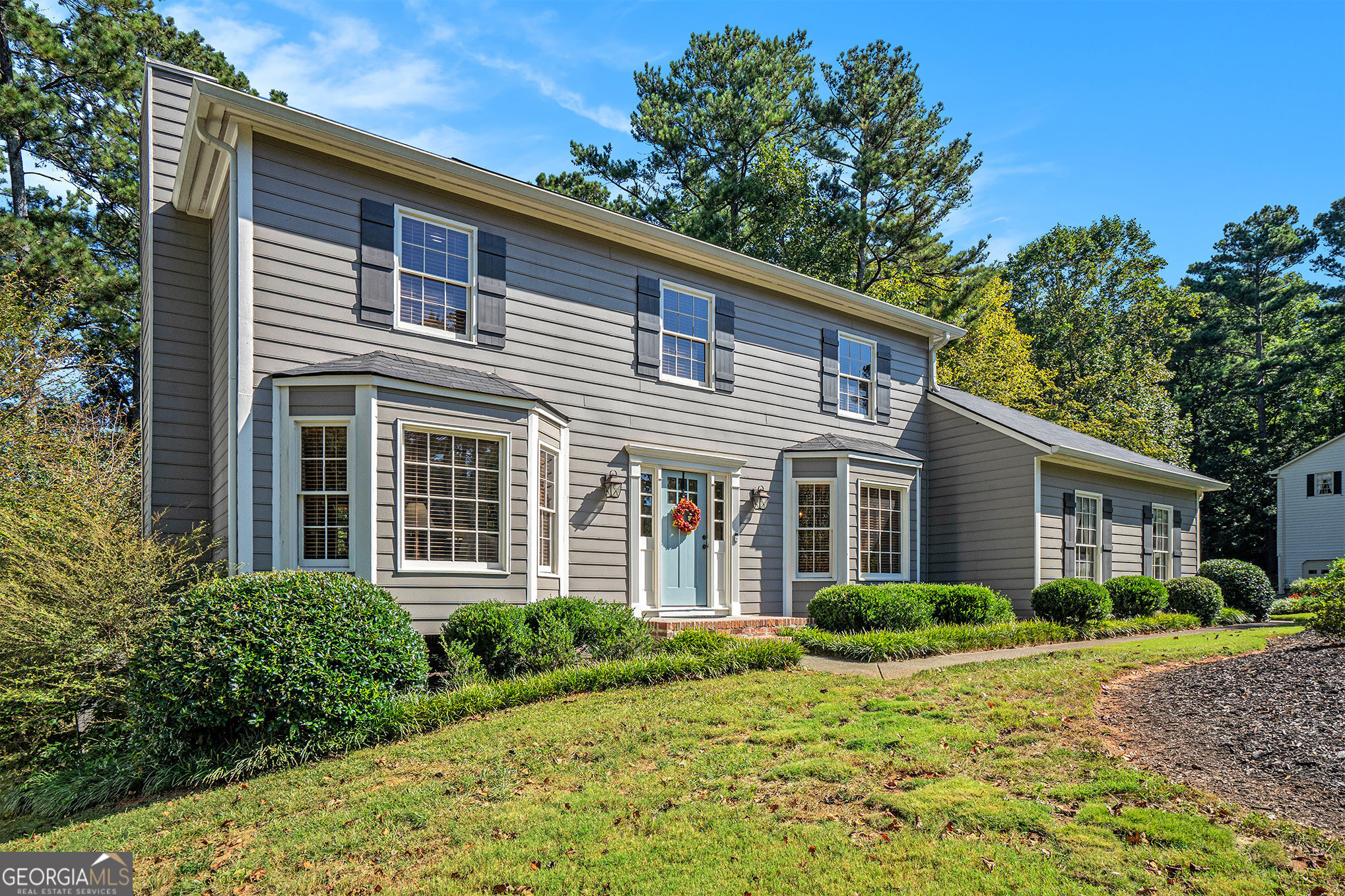 Immaculately Maintained Home in Huntington Subdivision Welcome to this beautifully maintained traditional-style 3-bedroom, 2.5 bath home in the desirable Huntington subdivision of Lilburn. Conveniently located near shopping, schools, and recreation, this home combines comfort, style, and functionality. Inside, you'll find real hardwood floors throughout the main level, a spacious formal dining room, and a cozy family room with a gas log fireplace. The updated eat-in kitchen features granite countertops, stainless steel appliances, and ample cabinet space. A large screened-in porch extends the living area and is perfect for outdoor entertaining year-round. All bedrooms are privately located upstairs, including the generously sized primary suite with a stunning ensuite bathroom featuring a designer double vanity and walk-in shower. Recent updates add peace of mind, including all bathrooms stylishly updated, a new roof, a 6-year-old HVAC system, a 4-year-old water heater, and a redone deck with brand-new screens. The property also offers an outdoor storage shed. As a bonus, Huntington subdivision offers an optional pool membership for summer enjoyment.