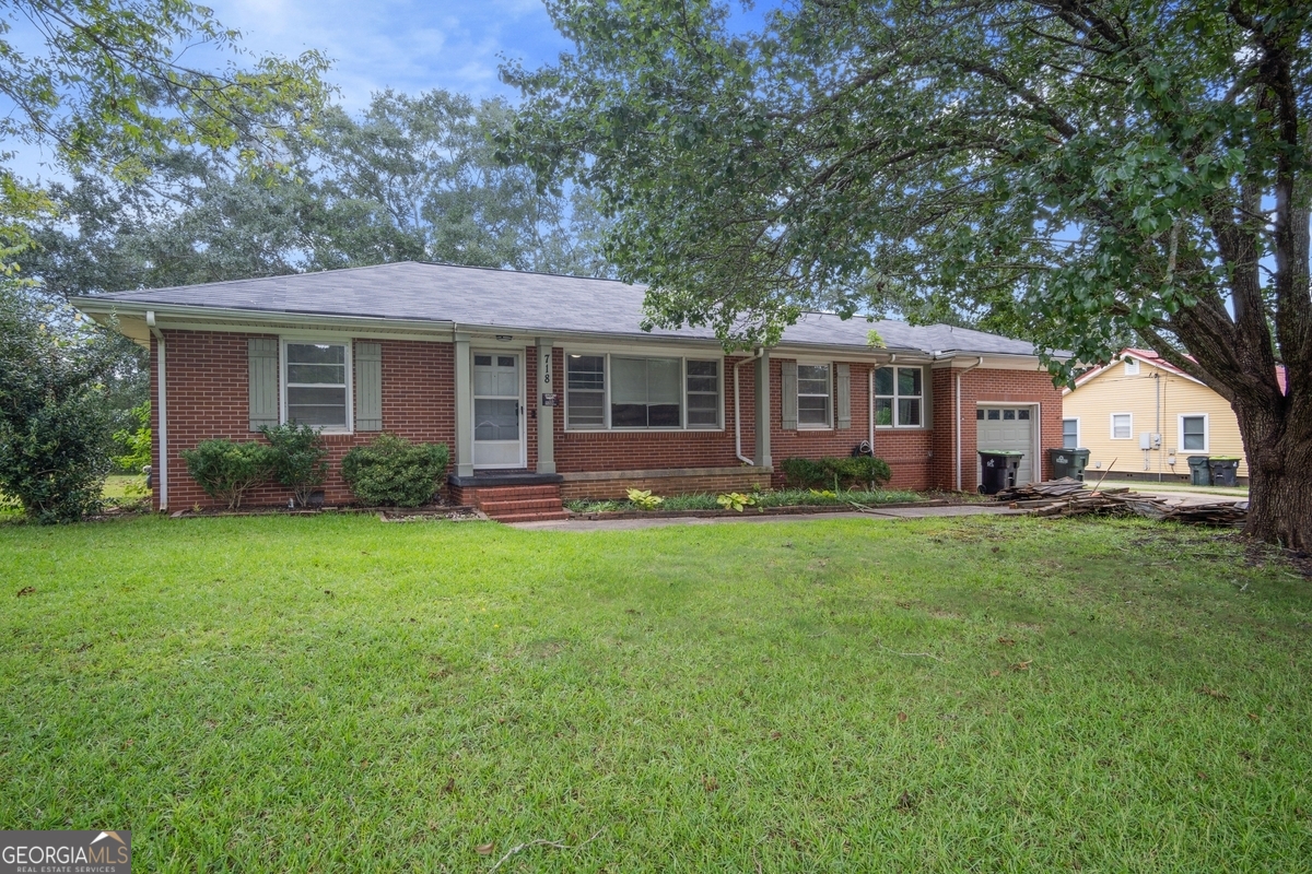 Updated 3BR/1BA all-brick home on a spacious 15,246 sq. ft. lot in the heart of Thomaston. Features include a remodeled kitchen with a newer gas stove and brand-new dishwasher, fresh interior paint, blown-in insulation, newer HVAC, and a recently replaced roof. Enjoy a large laundry room, fenced backyard, one-car garage, and Ring doorbell system. Move-in ready with no HOA, walk to downtown shops, restaurants, and events. Perfect for homeowners or investors!