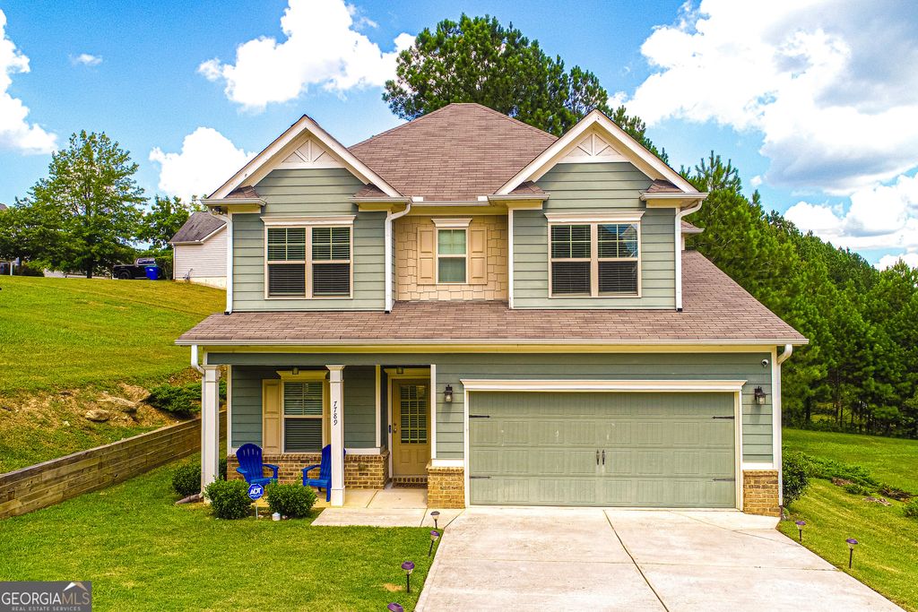 Photo of 7789 Village Pass, Fairburn, GA 30213 (MLS # 10658289)