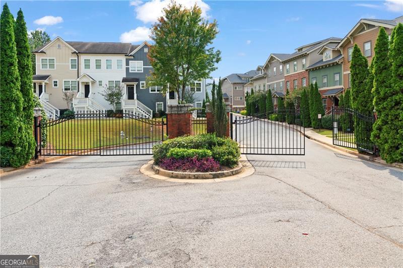 Welcome Home to 1424 Olden Lane in the exclusive gated community of Eastland Gates! Freshly painted from floor to ceiling, this beautiful condo shows exceptionally well! With 2 bedrooms and 2 full baths, you have separate living spaces both upstairs and downstairs with one bedroom and full bath at garage level and the primary suite, fireside family room with custom built ins, breakfast area, and kitchen on the upper level. The kitchen features stained cabinetry, light colored granite countertops, stainless steel appliances and a great desk area for home office space! The primary bath has a nice big walk in shower, soaking tub, and walk-in closet! The secondary bath also has a nice sized walk in shower! Enjoy a cool Fall evening out on your covered balcony and amenities in Eastland Gates include a community pool! Conveniently located just minutes from downtown, come and enjoy city living near the sought after East Atlanta Village, close to the Beltline, exclusive restaurants, entertainment, and shopping! This home is MOVE IN READY and available for immediate occupancy!