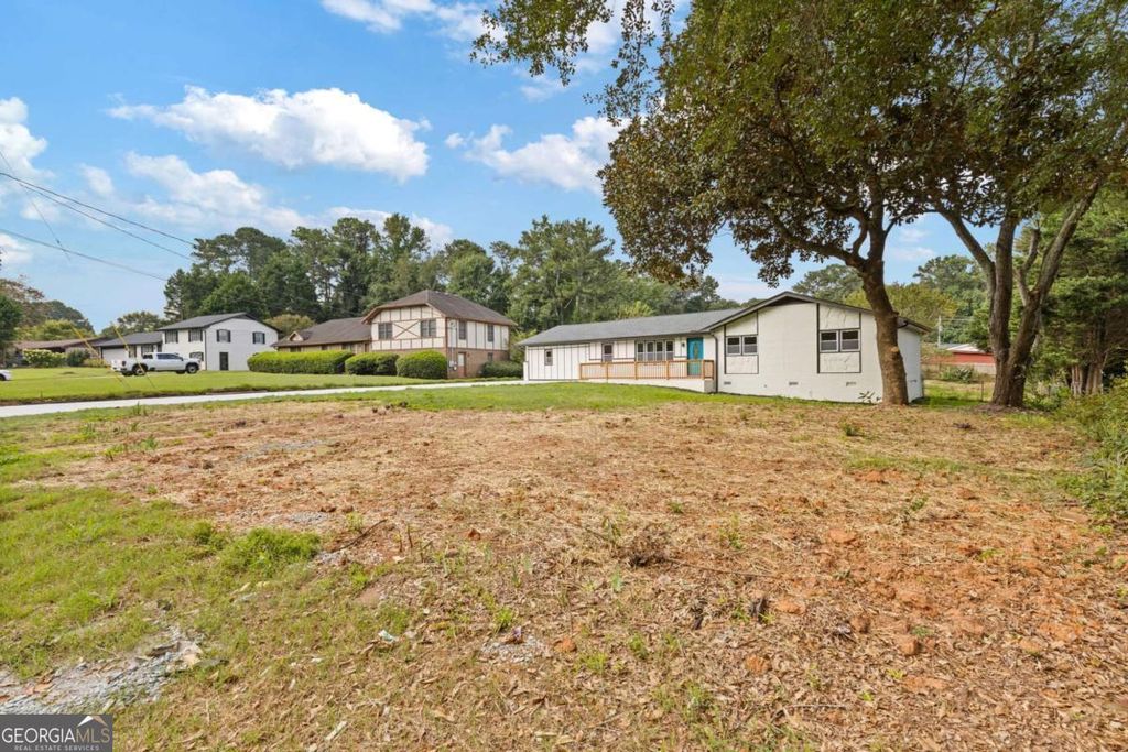 Photo of 237 Sandra Drive NW, Lilburn, GA 30047 (MLS # 10662501)