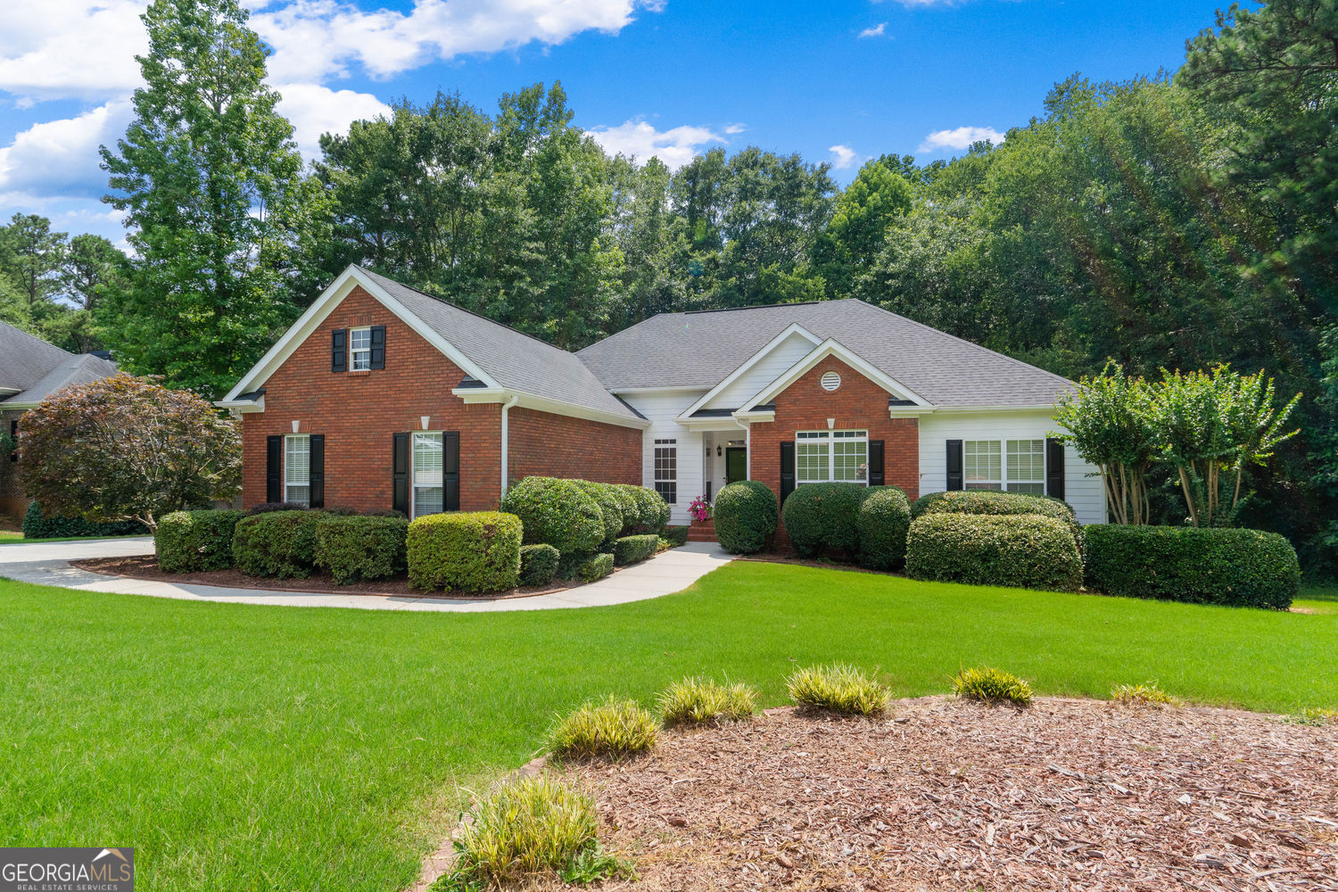 Magnificent RANCH home in a Swim/Tennis Community on 1.6 Acres with partially finished Basement. Home has 4 bedrooms and 4 baths. Features on main level include open floor plan with transom windows, recessed lighting and storm doors. Updated kitchen with granite countertops and freshly painted gray cabinets. Kitchen opens to bright breakfast area and family room with gas log fireplace that opens to freshly painted deck overlooking the wooded fenced backyard. Entry foyer opens to formal dining room and family room. Spacious owner's suite with sitting room/office, double tray ceiling, jetted tub, separate shower, vaulted ceiling and a walk-in closet. Finished basement with family room or media room, full bathroom, office or workout room, bonus room or 5 bedroom and two large unfinished rooms for storage. This remarkable property and community will not disappoint. It is conveniently located within minutes to I-20, schools and restaurants. Don't miss the opportunity to make this your home.