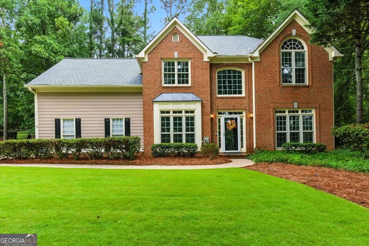 Here is a great home in Eagle Watch golf club community in Woodstock. We have a 5 bedroom, 3.5 bath home with 2 extra large master bedrooms. The master on the main could be used for an inlaw suite, an owners suite and also has handicap accessibility. This home has an open floor plan that the family room, the kitchen and the eat in portion of the kitchen can been seen across the rooms. The main floor has ceramic tile in the kitchen, LVP flooring in the master on the main as well as the foyer, dining, formal living room and the family room. Upstairs, has another master bedroom with updated bathroom, laundry on the upstairs floor level with all the other bedrooms. This great home is located across from the Eagle Watch Golf course which was designed by Arnold Palmer. The neighborhood parks are nearby along with great schools, great shopping and restaurants are nearby. Make an appointment today to see this great home.