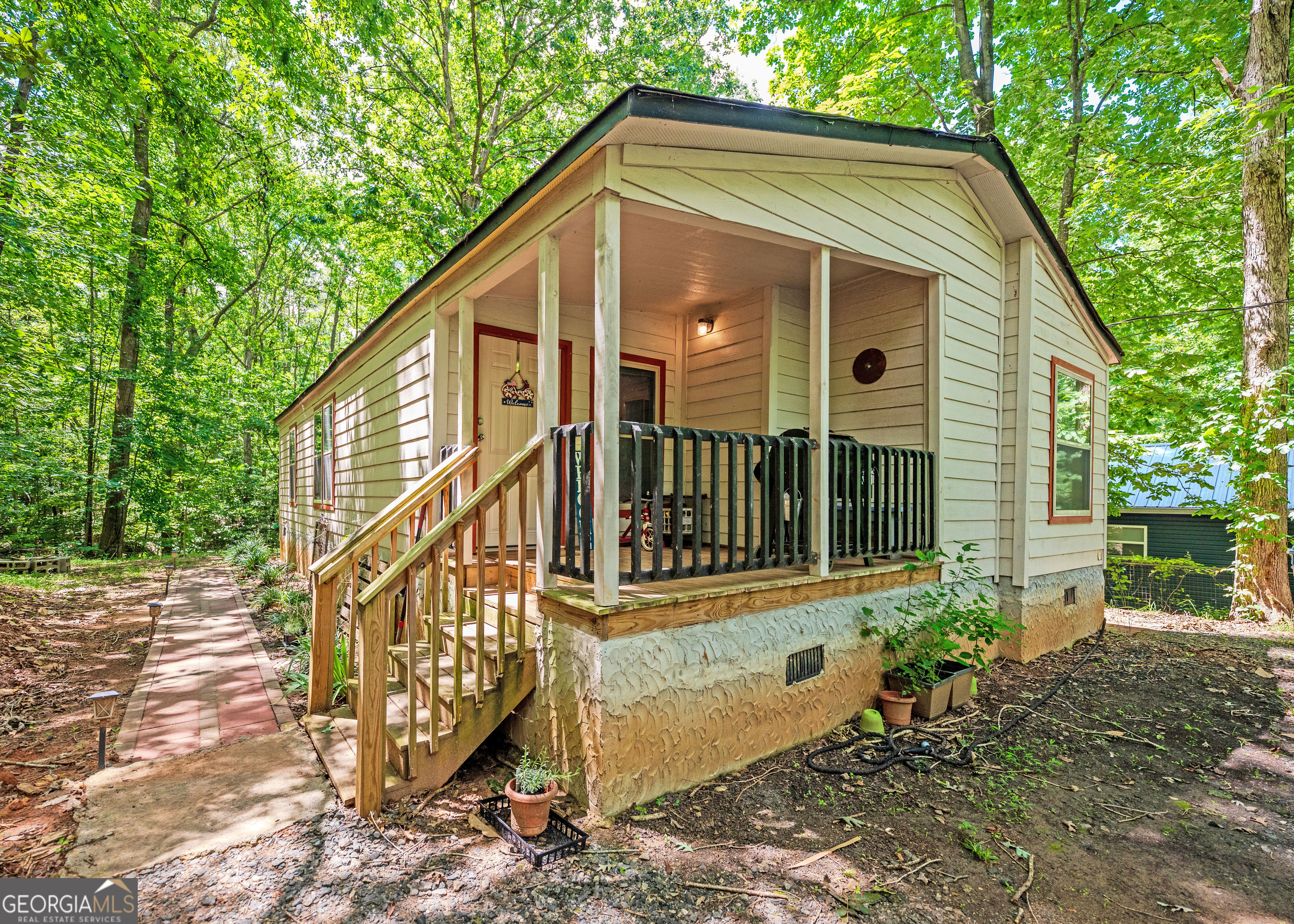 Highly motivated sellers! Bring all offers! This home qualifies for 0% and low down payment programs. Discover unbeatable value in this beautifully maintained 3-year-old home, located in the Lake Harbor Shores community in Martin, GA! Whether you're a first-time buyer, downsizing, or looking for a budget-friendly weekend retreat, this property has everything you need. Step inside to find 2 bedrooms and 2 full bathrooms, a spacious kitchen perfect for hosting and everyday living, plus a 10x16 storage shed for all your outdoor gear. Built in 2022, this home offers modern construction, energy efficiency, and peace of mind-just move in and enjoy! Enjoy life just minutes from Lake Hartwell, with a community boat ramp and additional public lake access 2 miles away for endless boating, fishing, and water fun. Don't miss your chance to own a nearly new home in a peaceful lake community-schedule your tour today!