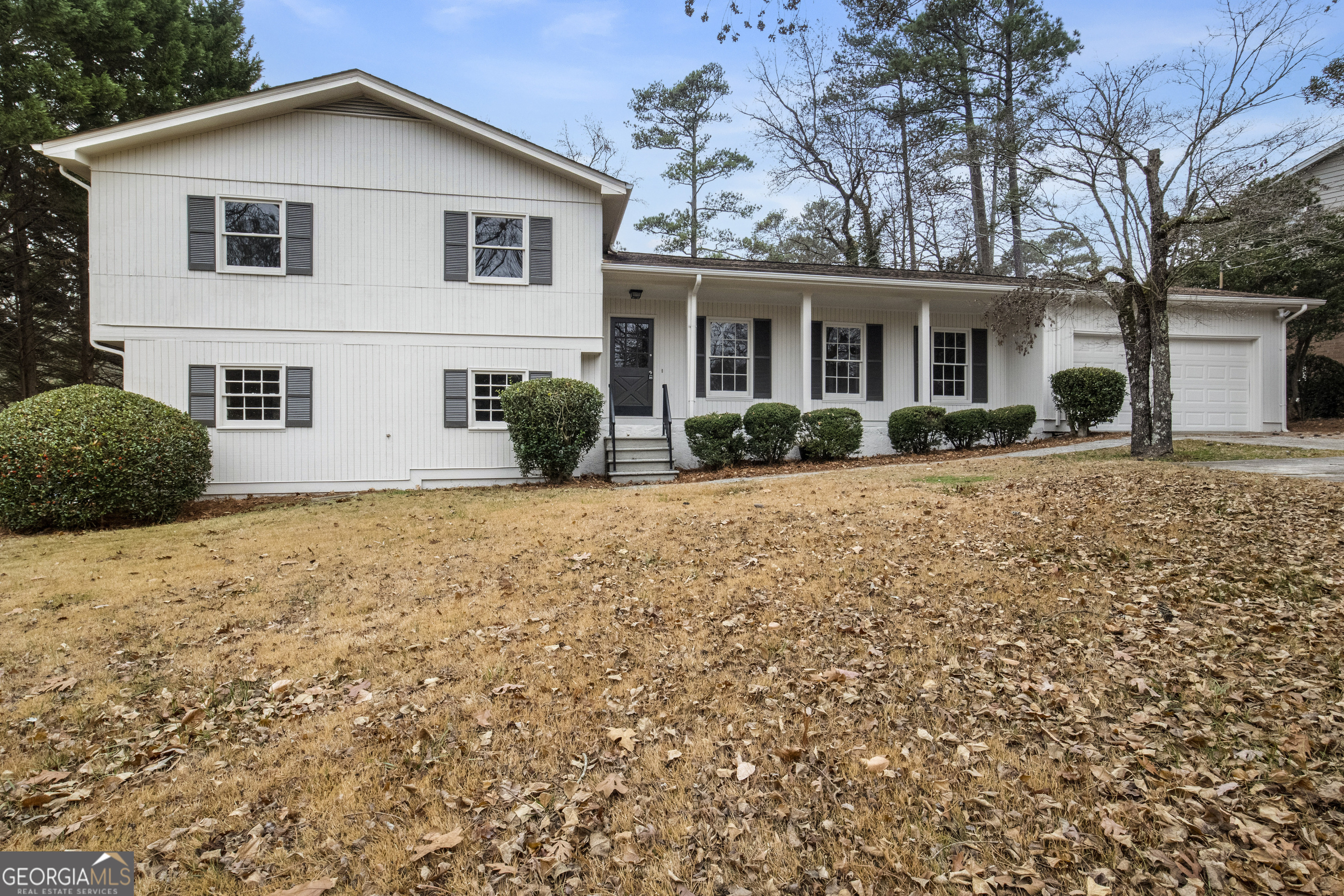 PRICED TO SELL!! Location, Location! TOTAL RENOVATION!! Top East Cobb Schools - Murdock, Dodgen, Pope! This wonderful split level home has just been completely remodeled painted and updated with a brand NEW KITCHEN and stainless appliances including refrigerator plus a very nice breakfast area. ALL THREE BATHROOMS ARE NEW and have also been remodeled with the most modern upgrades including a frameless shower in two of the baths. The main level space includes a living room, dining room and family room with fireplace with access to the updated deck and backyard. Terrace level has a huge multi use Bonus Room for playroom, office, fitness,TV room or whatever your needs may be! You will love the large backyard with plenty of room for children to play. Included with the home is an American Home Shield Home Warranty that was renewed in September 2024 and is transferable to the new owner! Close to loads of shopping, restaurants plus TOP schools and parks which makes this home an outstanding choice for your family! NO HOA!!