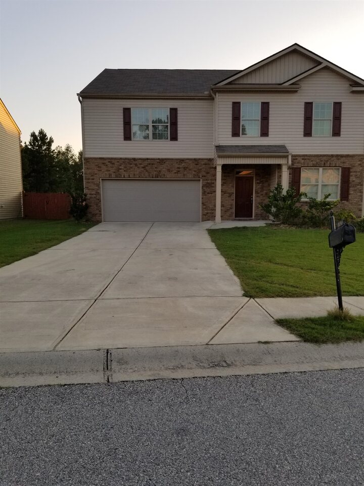 Beautiful, Huge three year old home in Arbor Creek Trail Subdivision. Open concept. Separate Dinning. Living room opening up to the Kitchen area. Breakfast area, Bedroom on the main floor with full bathroom. Master is upstairs with His and Hers Closets. Open area upstairs could serve as Computer room, Family Media area, Family Prayer area or children's play room. Property is close to Shopping, Chattahoochee Technical College, Well Star Paulding Hospital and more. Three more sizable bedrooms upstairs with Laundry room upstairs.
