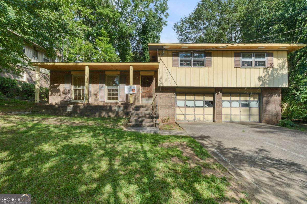 INVESTOR SPECIAL, PRICED ~$125K BELOW AREA COMPS! This 3 bed/2 bath home minutes from downtown Stone Mountain could be perfect for a Fix & Flip, Buy & Hold, Airbnb, or owner occupant looking to invest some sweat equity. Seller has already installed a new roof, replaced some subfloor, and installed new exterior doors. Home in need of cosmetic updates. Home offers a front porch that enters into the living room. Home offers dining area and kitchen with eat-in dining area. Separate living room with wood burning stove and new sliding glass door leading to the back deck. Master bedroom offers En-suite with stand up shower. Two great sized secondary bedrooms and secondary bathroom with tub/shower combo. Out back the large back yard are waiting for your personal touch.