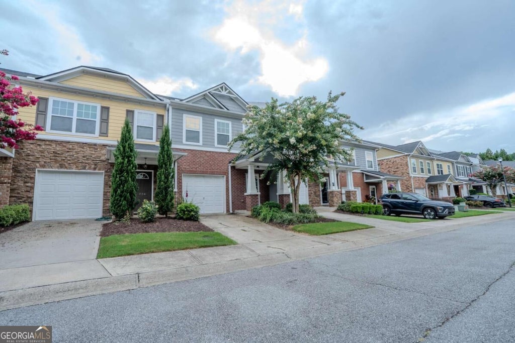 Photo of 776 Tulip Poplar Way, Lawrenceville, GA 30044 (MLS # 10867645)