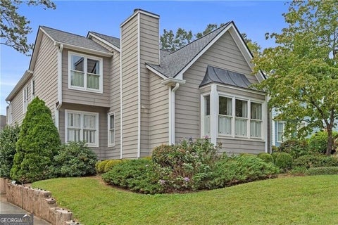 Photo of 1055 Club Place NE, Atlanta, GA 30319 (MLS # 10871200)