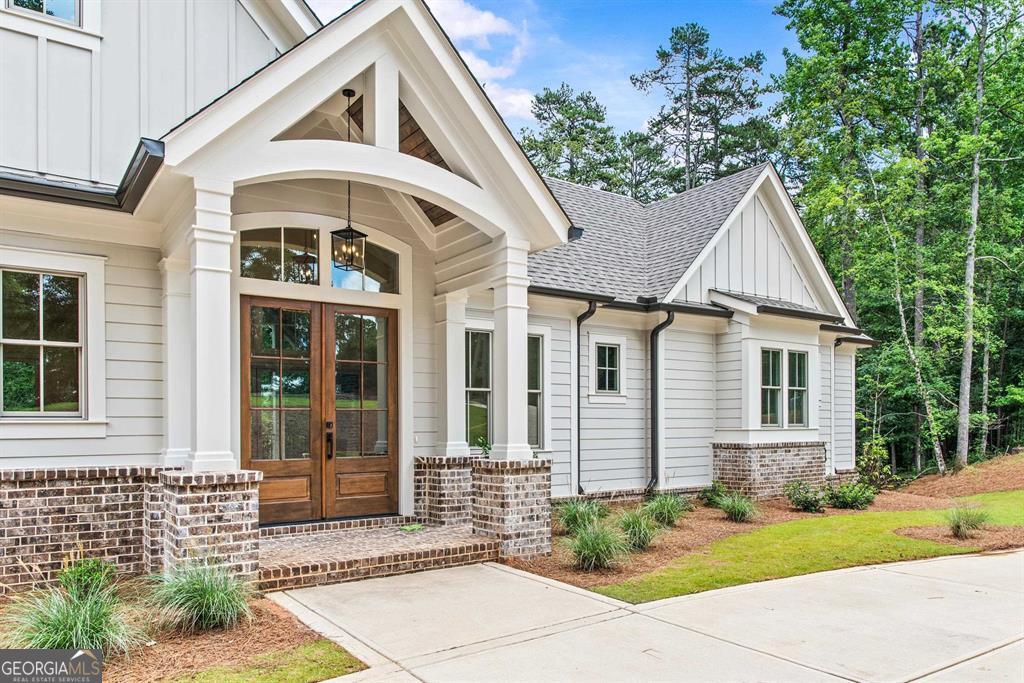 An amazing elevated lifestyle awaits you in this impeccably built 2025 Modern Family Home with Lake access. Prime location to nearby Richland Pointe and a short distance from The Tavern. Thoughtful design and comfortable living throughout this home. Main level living area has a vaulted ceiling and cast stone fireplace. Master suite - large bathroom with his and hers walk-in closets, floor to ceiling storage cabinets, free standing tub and frameless glass shower. Kitchen has custom cabinets including stained white oak island, Thermador 48" appliance package with dual fuel range and flush mount paneled refrigerator, quartzite countertops and backsplash, and plaster finish on vent hood. Pre-finished engineered French white oak flooring throughout the entire house. Powder room, laundry room, and walk in pantry with custom wood shelving Three car garage with car charging station and dog washing station too. With a golf membership available, you have access to seven Championship courses, dining and outdoor recreation opportunities. Lake access with a shared dock available.