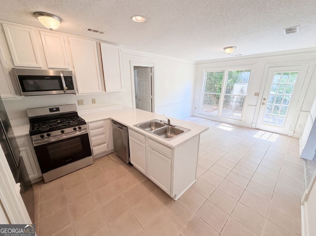 Photo of 1150 Magnolia Way SE, Smyrna, GA 30082 (MLS # 10753656)