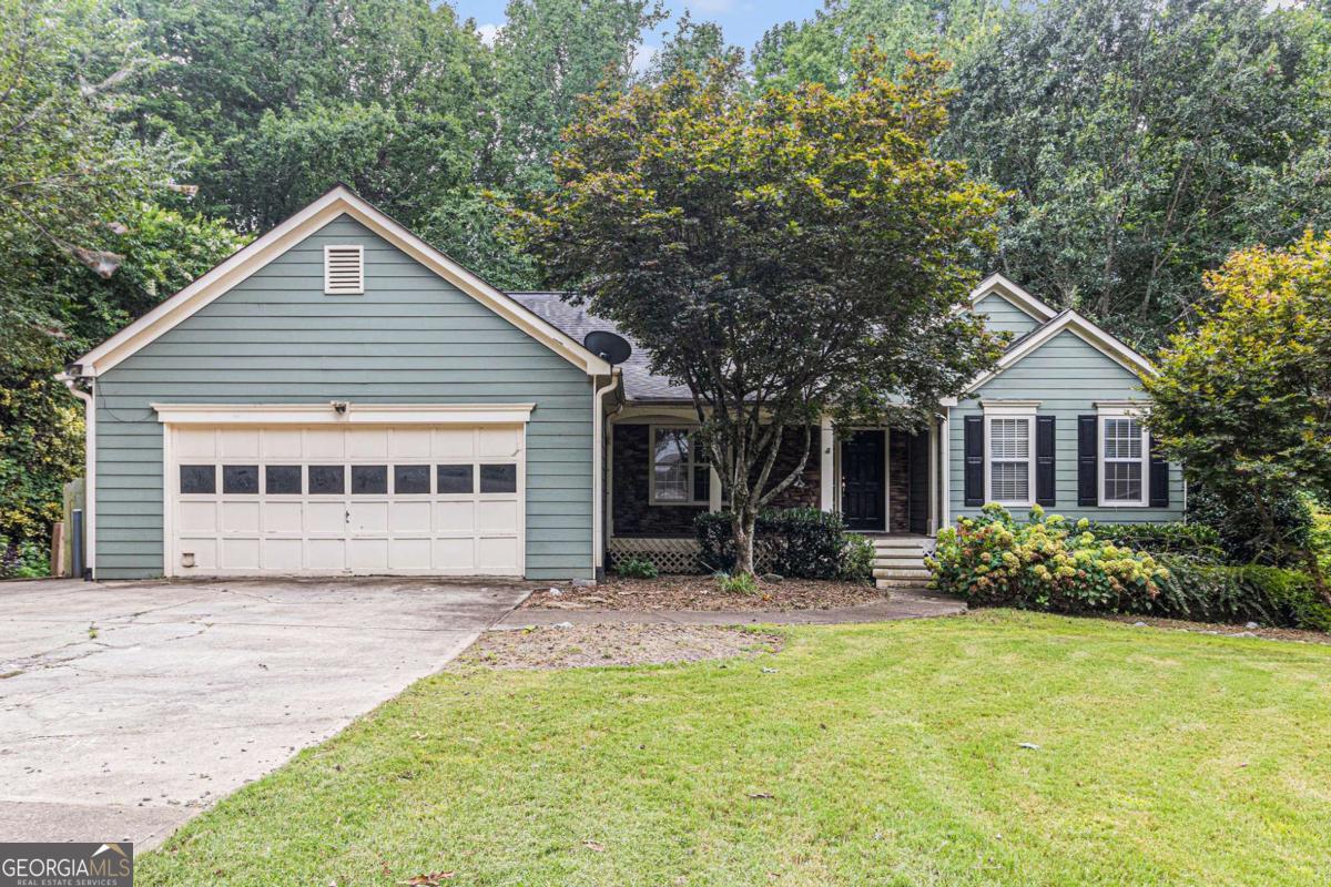 The perfect ranch-style home featuring a fully finished basement has arrived! Located in Ball Ground, GA just minutes from Hightower Rd and Ballground Rd, this spacious home offers vaulted ceilings, an open living area, a separate dining room, and an eat-in kitchen with views into the living space. The primary suite includes a double vanity, walk-in closet, and beautifully tiled shower. The finished basement adds incredible versatility with a full kitchen, dining area, living space, three bedrooms, and two full baths-ideal for guests, in-laws, or rental potential. Enjoy outdoor living year-round on two covered, screened-in decks and take advantage of the fully fenced backyard with a storage shed. Discounted rate options and no lender fee future refinancing may be available for qualified buyers-don't miss out on this exceptional opportunity!