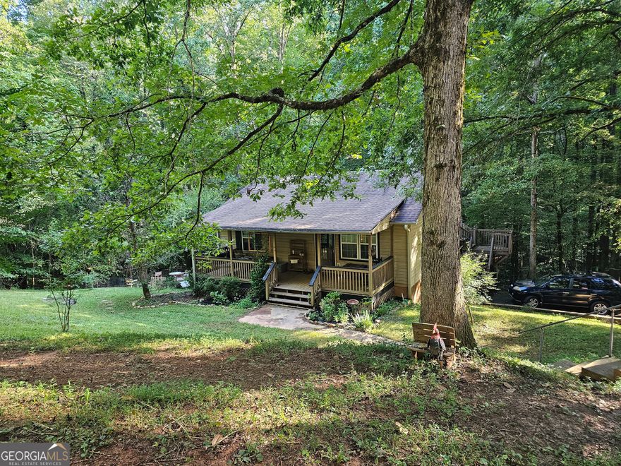 Check out this amazing location that can't be beat! This charming home is just 4 minutes from Publix and Home Depot, 10 minutes from the historic square of Dahlonega, and 15 minutes from Dawsonville! Enjoy convenient access to all the amenities, without the big-city noise. This house is situated at the end of a quiet neighborhood and has private, easy access to your own creek. This charming 2-bed 1-full-bath house has room for a 3rd bedroom in the basement.