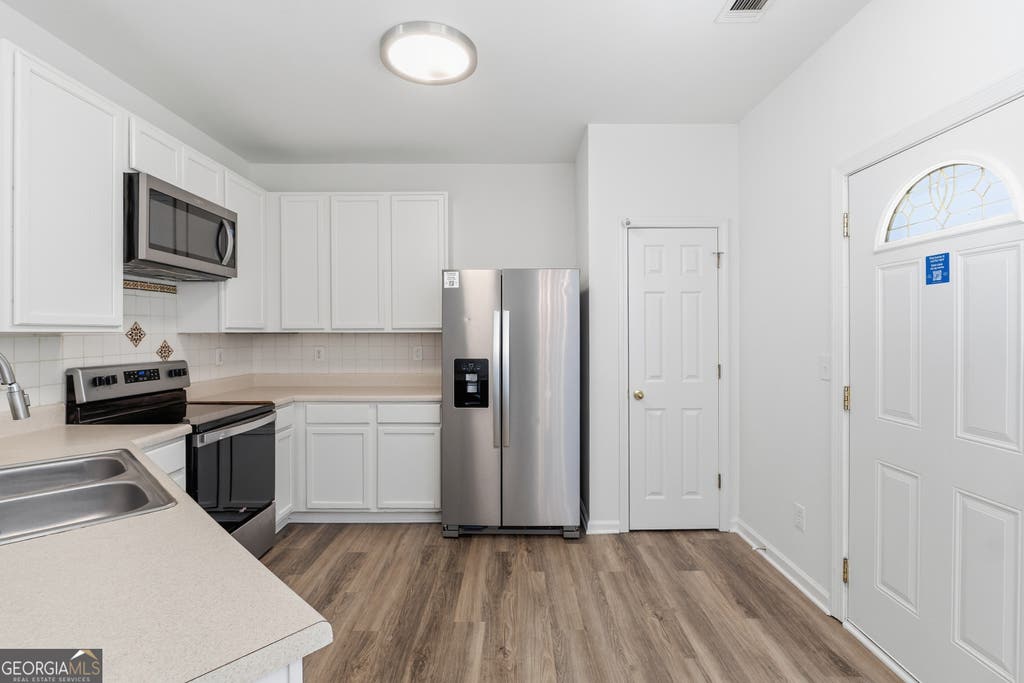 Photo of 7062 Brookview Creek, Riverdale, GA 30274 (MLS # 10818501)