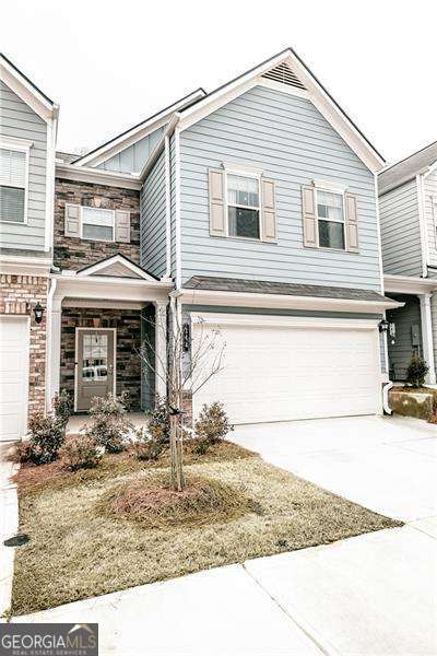 Gorgeous Updated Townhome Near Downtown Woodstock! Location, Location, Location! Don't miss your chance to rent this beautifully updated townhome in the highly sought-after Chelsea Townhome Community-just minutes from vibrant Downtown Woodstock! Enjoy the perfect blend of style, space, and unbeatable convenience. Step inside to an open-concept floor plan ideal for comfortable living and entertaining. The eat-in kitchen boasts brand-new MARBLE COUNTERTOPS, UPDATED FIXTURES, brushed gold hardware, stainless steel appliances, plus a large breakfast bar/island. The living room features a cozy electric fireplace and large windows that fill the space with natural light. Upstairs, the oversized master suite offers a spacious en-suite bathroom with double vanities, upgraded lighting, and a newly remodeled walk-in closet complete with a CUSTOM CLOSET SYSTEM. Two additional bedrooms provide ample space and closet storage-perfect for guests or a home office. Located just minutes from Downtown Woodstock's shops, restaurants, entertainment, and events, and with quick access to I-575, this townhome is perfectly situated for modern living. ?? Available for rent now! This stunning townhome won't last long. ?? Owner is a licensed real estate agent.