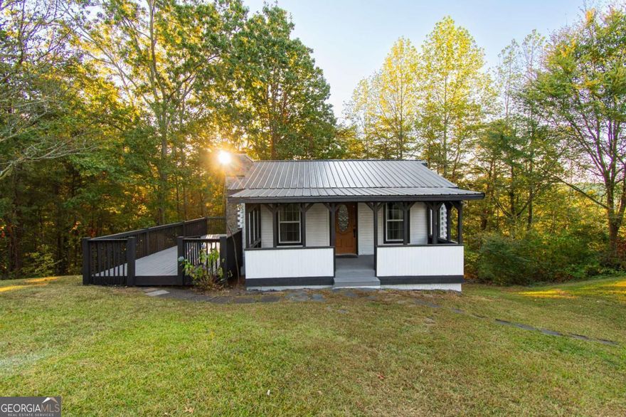 Charming Cabin in Beautiful North Georgia - Your Mountain Retreat Awaits!    Welcome to your next home, second home, or vacation getaway! This delightful 2-bedroom, 2-bathroom cabin offers the perfect blend of comfort and rustic charm. Enjoy breathtaking views from the spacious sunroom, ideal for relaxing or entertaining year-round.    The property also features a detached two-car garage, providing ample storage or workspace. Nestled in the serene North Georgia mountains, this peaceful retreat is the perfect escape from the everyday hustle.    Don't miss this opportunity to own your slice of mountain paradise - schedule your showing today!