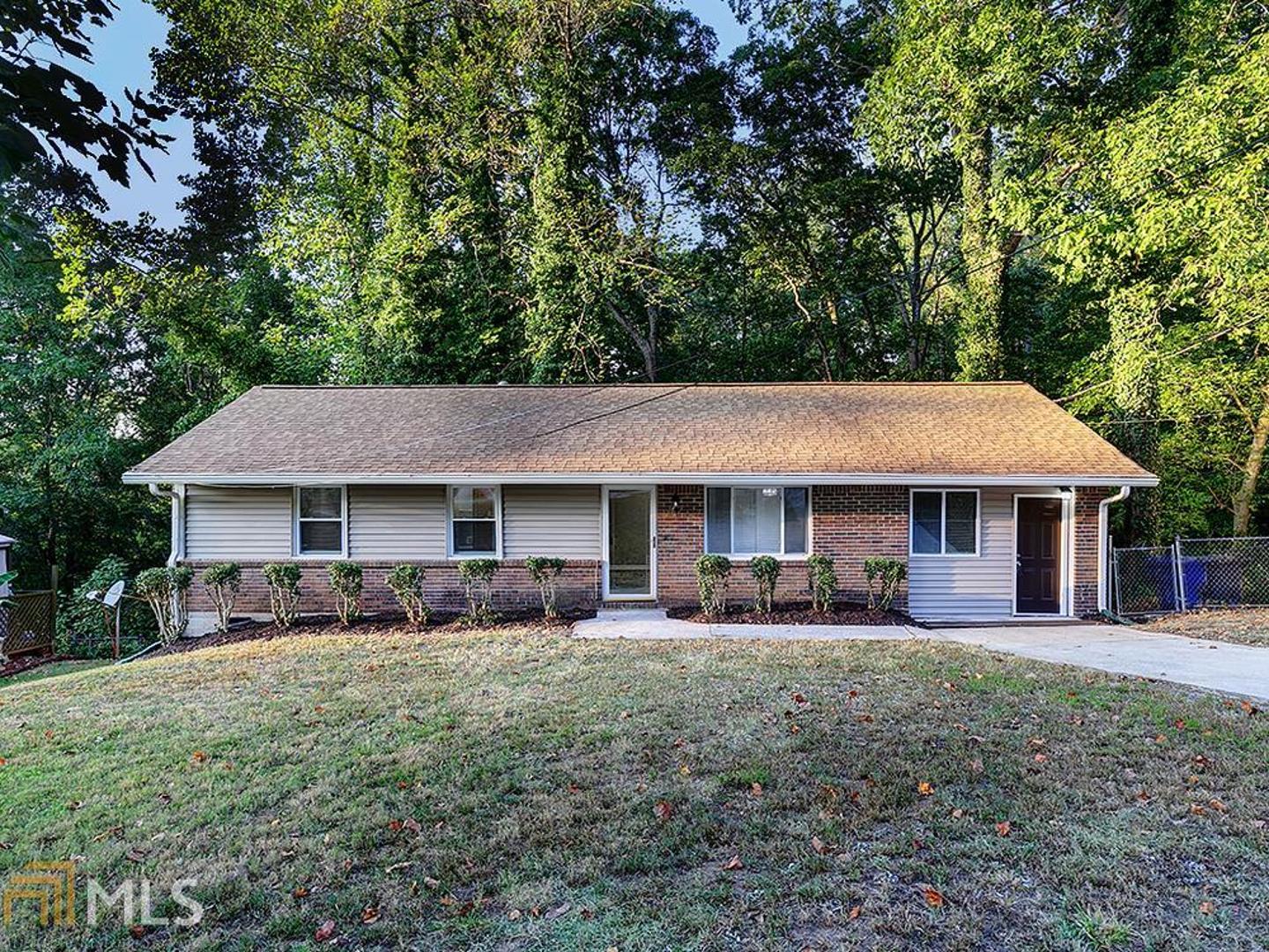 Incredible ranch in Marietta with stunning renovations! Step inside your living room with New Floors & Light Fixtures with large windows bringing in plenty of natural light. Living room opens to kitchen/dining area combo. Enjoy cooking in your new kitchen featuring SS Appliances, New Floors, & stylish Backsplash. Garage converted into additional bedroom for maximum space! Both secondary bedrooms & Master Suite have new carpet. Master offers custom built En Suite bath w/ standing shower & tiledloors & new vanity. Hall Full Bath features tiled shower and floors, & new vanity as well