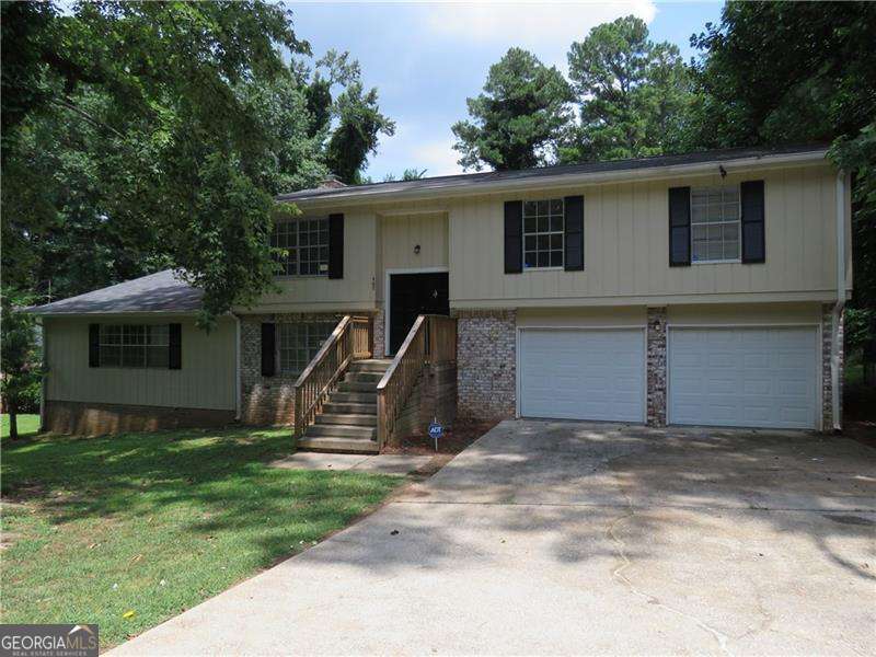 Opportunity Knocking - Expansive Home with and Additional Large Lower Level 1 Bedroom / 1 Bath Living Suite with Living Room Area, Family Room Area with Fireplace . Exciting Brick & T-111 Sided Split Foyer with Newer Paint - Total 4 bedroom, 3.5 Bath Home with Character and Charm. Light, Bright and Open Describes This Well Designed Floor Plan that Flows. Ideal For Generational Living. Open Spacious Foyer Greets Your Guests. Entertainment Size Living Room for Hours of Quality Time. Open Dining Room to Expand Your Seating For Guests. Spacious Culinary Kitchen To Home Your Cooking Skills with Large Island Area. Easy Spacious Nice Size Bedrooms with Two Hall Baths Upstairs. Half Unfinished Lower Level. House with Great Utility and Potential. Located in the Convenient Sought After Stone Mountain, Ga. with Easy Access to Everywhere. Location with Close Proximity to Support Services, Major Roads, Education Facilities and Medical Facilities. The Seller Has Never Occupied Subject, It Was Used Prior as a Rental Property. This Home is Being Sold " As Is", Where Is With No Disclosures. Buyers Will Have the Right to an Inspection. On Septic. Selling Agents See HOA for All Details If One Exists. The "Closing" Shall Not Occur Within 21 Days of Effective Binding Date. Seller Needs Time to Coordinate Title and Closing. Home Will Need Some Attention to Details. Inspect, Compare and Price for Area!