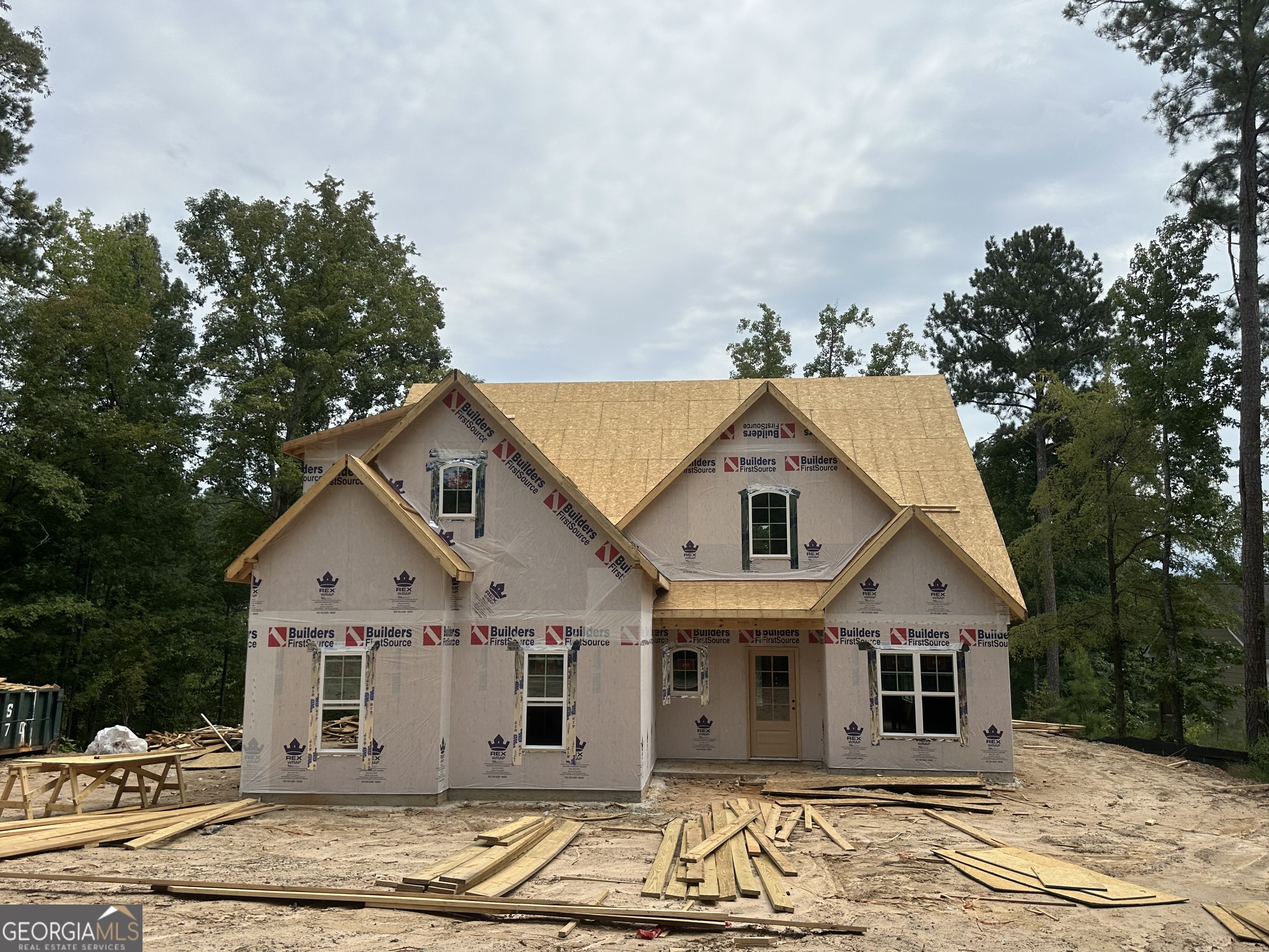 Beautiful New Lakefront Home on Lake Sinclair! Welcome to 210 Erin Shores Dr, Sparta, GA - a brand-new build situated on a 1.04-acre Max Dock lot with stunning views of pristine Lake Sinclair. This 2,205 sq ft home offers 3 spacious bedrooms plus a bonus room and a loft/second living area, designed for comfort and functionality. Builder can make loft a 4th bedroom if requested. Enjoy lake living at its finest with a huge covered back porch, outdoor kitchen, a private stairway to the water, and a premium dock ready for your boat and lake toys. Quality finishes include spray foam insulation, James Hardie siding, underground power, and county water for low-maintenance, energy-efficient living. This new lakefront retreat is currently under construction and offers the perfect blend of modern comfort and lakeside living. As part of the community, you'll also enjoy access to tennis courts, a clubhouse, basketball courts, picnic areas, shuffleboard, a boat ramp, and an additional community dock. There is an HOA. Seller is a licensed real estate agent in Georgia, License #216409.