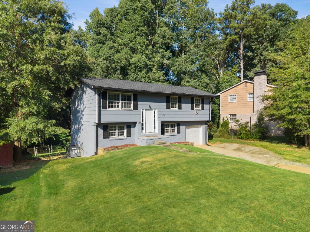 Photo of 10555 Thrasher Road, Jonesboro, GA 30238 (MLS # 10838334)