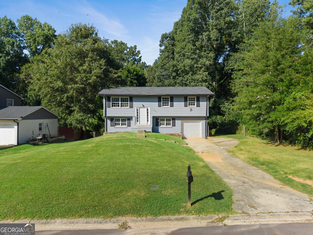 Photo of 10555 Thrasher Road, Jonesboro, GA 30238 (MLS # 10838334)