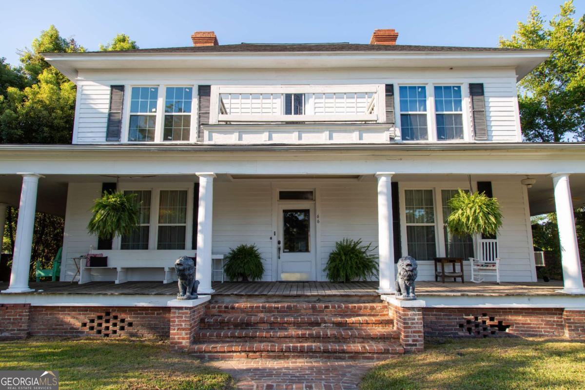 Own a part of Appling County History with this beautiful Gem! So many of its original gorgeous details are still present from the wood floors, one of a kind chandeliers, stain glass windows, beautiful fireplaces in many of the rooms and much more! 3,462 sq ft of pure beauty and southern charm. This home is truly one of a kind and absolutely breathtaking from the moment you step up on the large wrap around porch and enter through the door you feel like your taking a step back in time. This home is a must see ! New roof was put on in June of this year. In 2019 the 2 HVACS updated. 4 Bedrooms 2 full baths. Loads of space for entertaining including a huge Kitchen! Detached garage with a loft and Private backyard. Schedule your personal tour today and lets get started on making this grand home yours! Situated in a Prime Location giving it flexibility on being used as residential home or rezoned easily to use as a Beautiful Venue as well as many other possibilities.