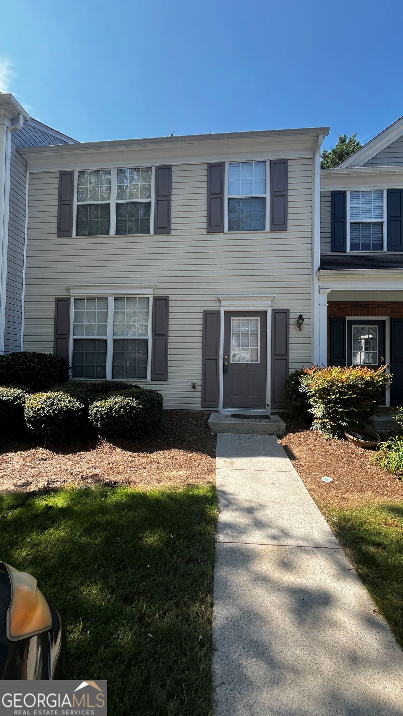 An amazing, remodeled home in desirable Alpharetta/Johns Creek area. Inviting foyer welcomes you into the fireside family room with laminate flooring, new paint and views the bright kitchen which features granite countertops, tiled backsplash, refinished cabinets, tiled floor, breakfast bar, new paint, gas stove, dishwasher and refrigerator. Separate dining room has sliding glass doors to the very private patio and back yard. Owner's retreat is upstairs with a vaulted ceiling, remodeled bathroom, new custom double vanities, stone counter tops, tiled floor, garden tub, huge walk-in closet, new paint, 2" white blinds, new light fixtures, ceiling fan, laminate flooring. 2 additional spacious bedrooms, laminate flooring, remodeled bath with new custom vanity, stone countertop, tiled floor, new paint, new light fixtures, ceiling fan and 2" white blinds. Laundry room is upstairs. Additional features - No carpet, new interior paint, laminate flooring throughout, new light fixtures, 2" white blinds, ceiling fans in all bedrooms, remodeled bathrooms, refinished kitchen cabinets, new custom vanities - better than new. Top schools, walk to dining, shopping. Convenient to Ga400. Included in rent - water, sewer, trash and lawn care.