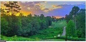 Wow!!! This Incredible 2.2 Acre Corner Private Corner DOUBLE LOT on a Cul De Sac with a picturesque pond and tree lined views in the prestigious gated Manor Golf and Country Club and the award-winning Milton School system is now available for your new custom dream home. This gorgeous grand estate home site is a rare gem with easy access to the incredible in community Tom Watson designed championship golf course and offering natural preserve views while being easily walkable to the country club, indoor and outdoor pools, indoor and outdoor tennis courts, sports courts, multiple restaurants, gym, spa, golf shop and more so you can appreciate resort styled living at its best every day! With this expansive private estate lot, your dream custom home can be a reality. There's no place like home when you Live in The Manor Golf and Country Club and no other home site like this one saved for last!
