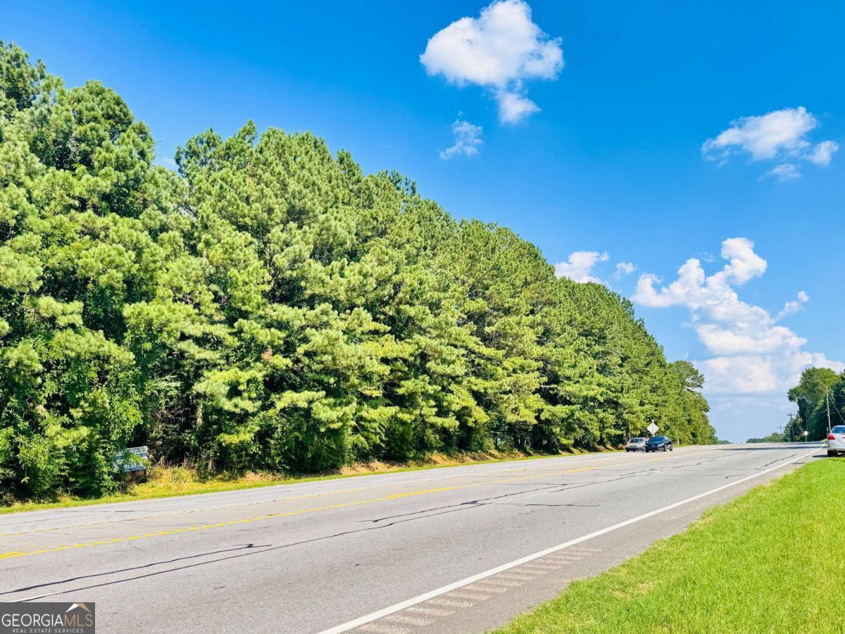 Over 6 Acres on US 441 Prime Development Site North Athens, GA Excellent opportunity to own 6.15 acres with high-visibility frontage on Hwy 441, between Athens and Commerce. Located in a rapidly growing retail and residential location , this build-ready property includes 3 water hookups and a 3,000 sq ft metal building with 25 ceilings. Currently zoned AR perfect for rezoning and development. Ideal site for a Convenience store ,Restaurant ,RV park, Subdivision, or your own private retreat. High traffic. High growth. Endless potential. 1. 502 Feet of Frontage, 2. water hookups are already in place, 3. 3,000sf steel/alum prefab building, 4. workforce