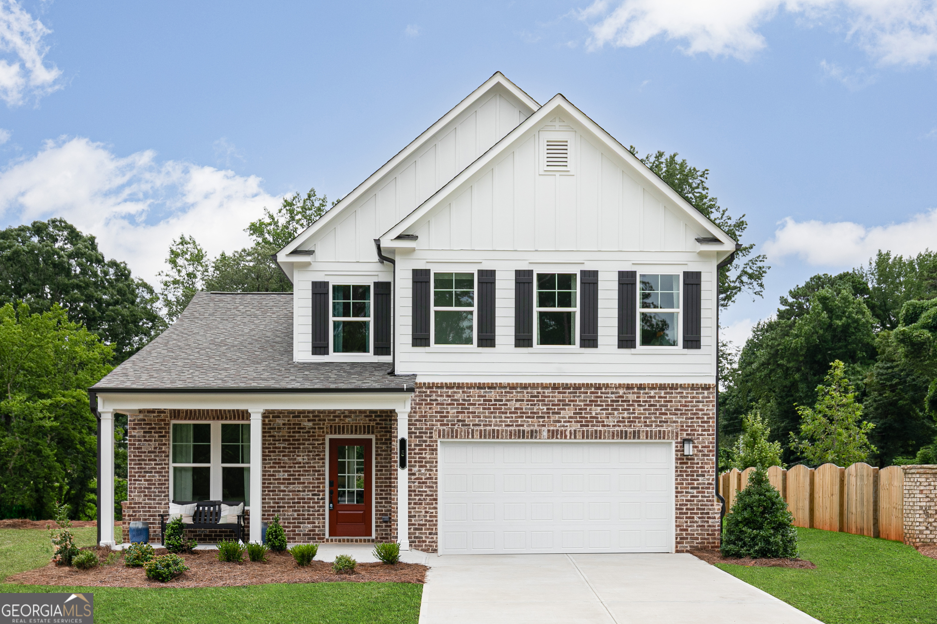 Welcome to the Hollins floorplan by Stanley Martin, you can mix and mingle with friends and family in your open-concept first floor, which includes a kitchen overlooking the family room and dining area. A bedroom at the front of the home can be used for guests to have their own private space. The covered front porch or rear patio provide the perfect spot to relax and enjoy your new home. Upstairs, the Primary suite boasts ample space, including a large walk-in closet off the on-suite bathroom with double vanities, walk-in shower and separate soaking tub. Additional bedrooms provide the perfect place for family or friends to rest their heads at night. Plus, take the chore out of doing the laundry with a conveniently located laundry room on the upper level! Some of the SMart Selected design options in this home include a gourmet kitchen & center island, large owner's suite with walk-in closet and on-suite bath, patio, main level bedroom and full bath. Lot 83. River Oaks is perfectly positioned to offer the best of Locust Grove living. With easy access to I-75, you will be minutes from: Tanger Outlets, Historic Downtown Locust Grove, Shopping and dining destinations. The area is also surrounded by popular attractions, including Noah's Ark Animal Sanctuary, High Falls State Park, and the Atlanta Motor Speedway. Photos shown are of a similar home.