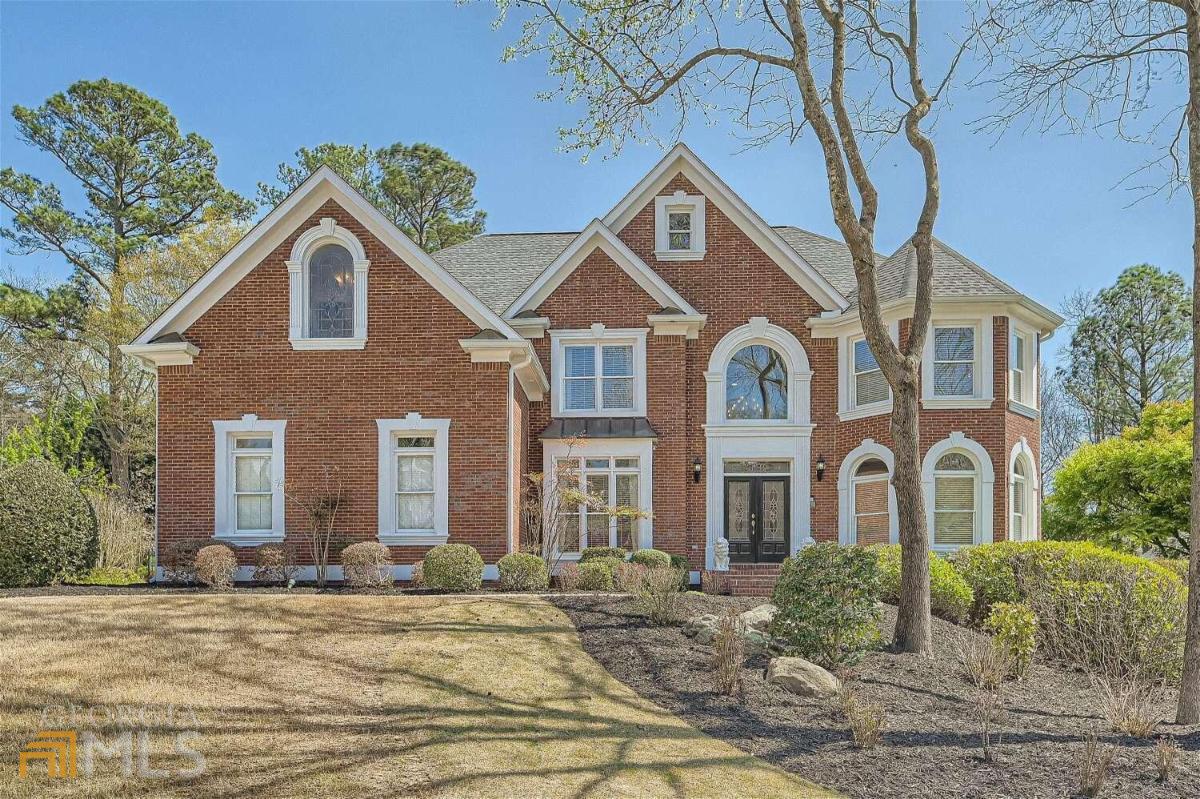 Immaculate 5 bedroom and 5 Bathroom Executive brick home located in the coveted Glen Abbey Neighborhood.a This wonderful home has approximately 5,100 SF of living space plus an amazing OUTDOOR entertaining area. The Main level features a grand two-story foyer that is flanked by a large formal Dining Room with tray ceilings, and an executive Study for work at home or relaxing. The Gourmet Kitchen is well equipped with beautiful custom maple wood cabinets, an oversized Island with granite counter tops,awrap-around Butlers Pantry with glass doors,aaStainless Steel appliances, walk-in Pantry and a roomy Breakfast Nook.a The Great Room features a 2-story wall of windows which lets in plenty of natural light plus a floor to ceiling stack-stone fireplacea accompanied by a pair ofacustom wood built-in bookshelves.a A Guest Suite/Office with Full Bath completes the Main Floor.a The home has two separate staircases that lead up to the second level where there is a spacious Primary Suite and a Sitting Area with a cozy fireplaceathat is perfect for reading a book or watching TV.a The spa-like Primary Bath features dual vanities, custom wood cabinets, a deep soaking tub, a separate oversized shower and his and hers closets. The 3 spacious secondary Bedrooms feature vaulted or tray ceilings, with either a private or Jack /Jill bathroom. A nice size Laundry Room with built-inalaundry sink completes the second Level. The finished terrace level is an entertainer's dream!! This amazing space features a TV/Media Room with 100 inch screen with projector and built in speakers, Billiard Area, full custom built Wet Bar with glassashelves/doors, refrigerator and granite counter top, walk in Wine Cellar with custom Iron doors, Kitchenette, Office Space, and Workout room/Bedroom. (perfect for an In-law suite) The full bathroom with a steam room/shower rounds out the Terrace Level.a The resort-like backyard features an extended deck overlooking the large premium fenced-in wooded yard, screened in under-deck entertainment area with a flagstone floor, outdoor grilling bar and large oversized flagstone Hot Tub with Waterfall (Spool).a Glen Abbey is one of North FultonCOs most popular Swim/Tennis Community with Clubhouse, Fitness Room, Olympic Pool, Splash Park, Sports Court, 11 Lighted Tennis Courts, 4 designated Pickleball courts, on-site tennis professionals, 2 Playgrounds, Community Lake, Sports Field with Covered Cabana, and Walking Paths. Conveniently located to GA 400, Avalon, Historic downtown Alpharetta, Big Creek Greenway and top-rated Alpharetta schools.