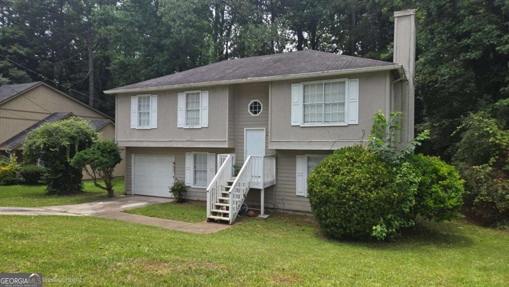 Photo of 5339 Biffle Downs Road, Stone Mountain, GA 30088 (MLS # 10805103)
