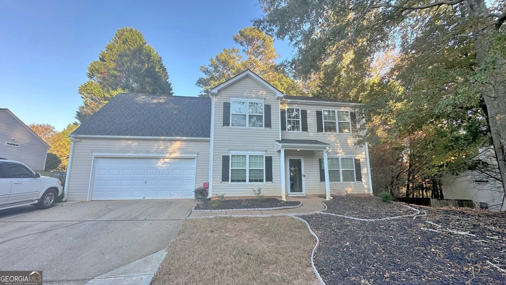 Photo of 7555 Tatum Woods Drive, Cumming, GA 30028 (MLS # 10880396)