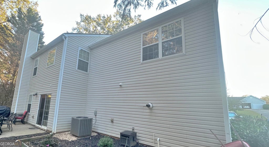 Photo of 7555 Tatum Woods Drive, Cumming, GA 30028 (MLS # 10880396)