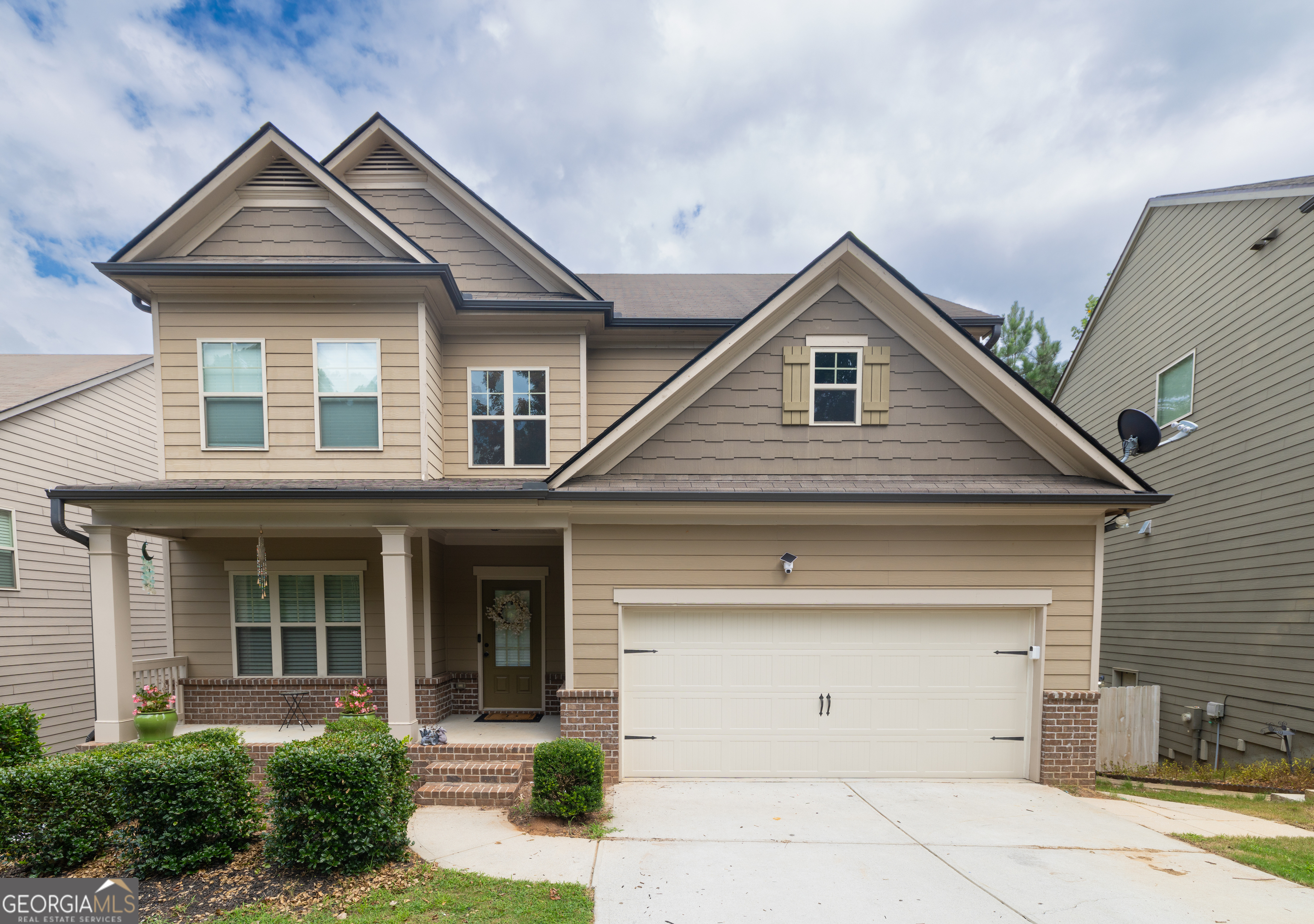 LOCATION LOCATION LOCATION!! This 5-bedroom, 3.5-bath home is located in the Maplecliff community. The main level features a spacious living room with dining area, hardwood floors, and access to the deck, which has stairs leading down to a large, private, fully fenced backyard with a stone patio and built-in fireplace. The kitchen has been updated with a modern backsplash, new countertops, and opens to the living area, which gets great natural light and includes a gas fireplace. Upstairs you'll find all the bedrooms, each with good space and natural light. The primary bedroom includes a large closet and a private bathroom with separate tub and shower. The finished basement adds extra living space with an additional bedroom and a full bathroom. The home is conveniently located near schools, downtown Sugar Hill, Lake Lanier, and just minutes from the Mall of Georgia. A solid opportunity in terms of location, space, and condition. Worth seeing.