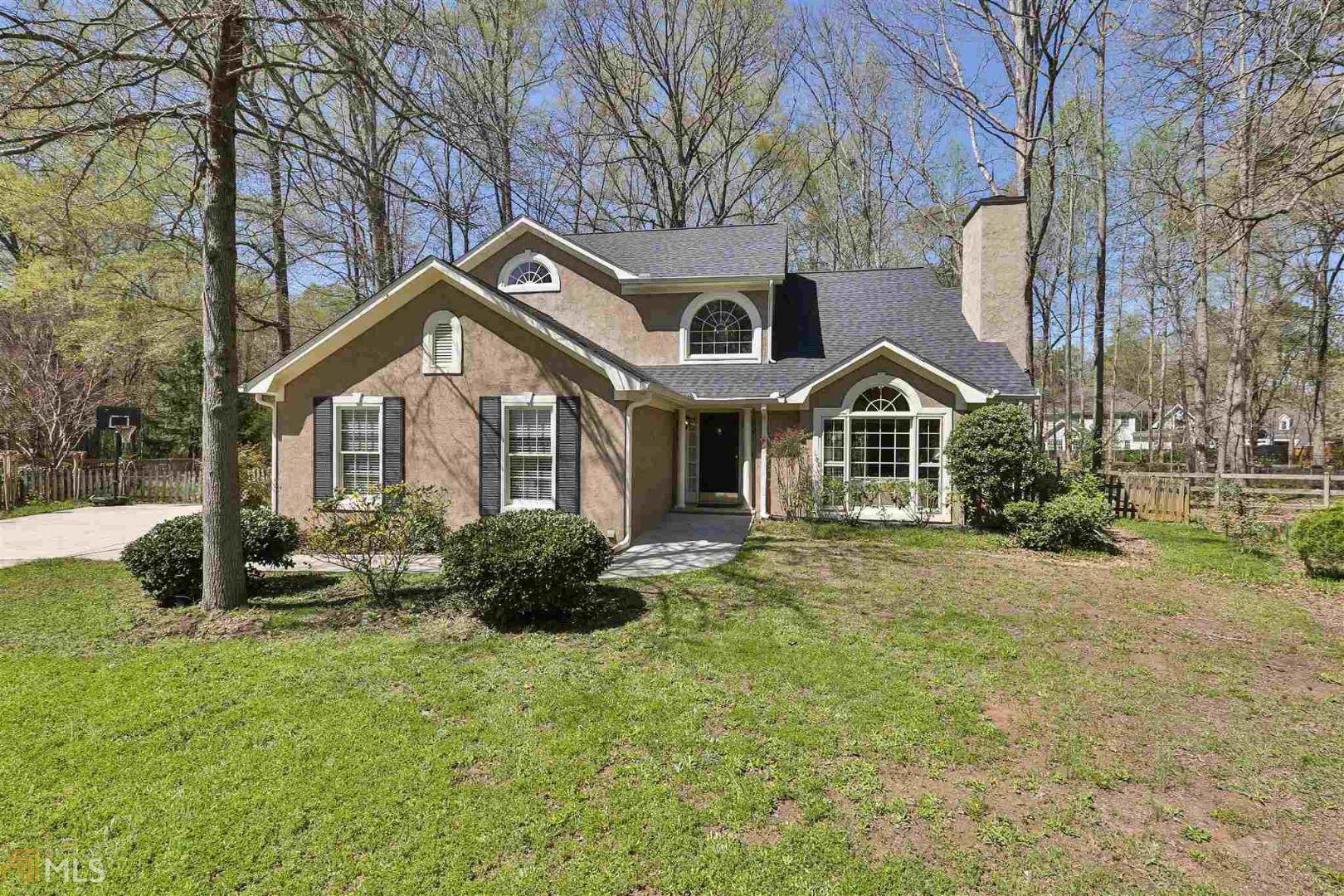 Come home to this lovely 3 bedroom 2.5 bath nestled on a cul de sac lot with fenced in back yard and quick access to the paths. A spacious great room with soaring ceilings and lots of windows for natural light welcomes you. A dining room, half bath, laundry room and extra- large kitchen with granite counter tops and views of the backyard complete the main floor. Walk up the grand staircase to 3 bedrooms and 2 baths. The master bath has updated fixtures and plenty of closet space. Hardwood floors throughout the entire home except the kitchen. The roof is only 1.5 years old! Award-winning PTC schools and nearby shopping make this one you don't want to miss. Need a private tour, simply contact Amy.