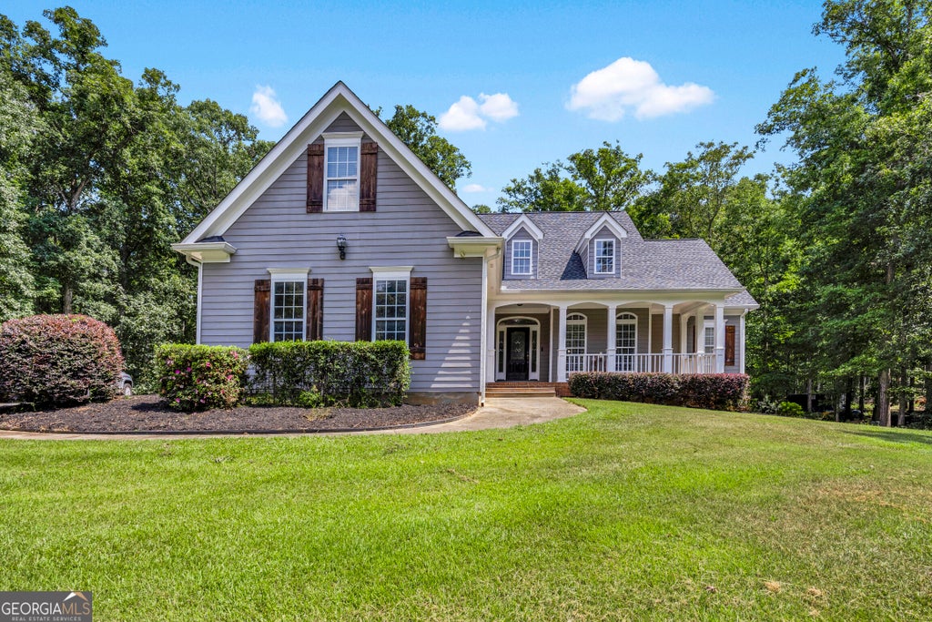 Photo of 405 Rosser Road, Covington, GA 30016 (MLS # 10839740)
