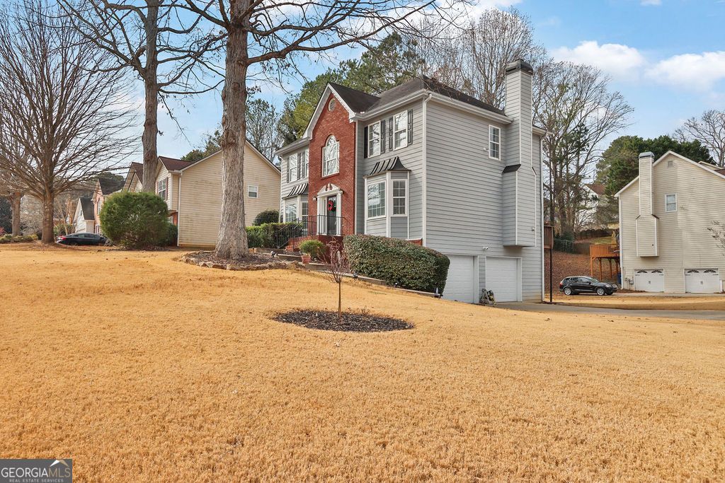 Photo of 725 Somerset Vale Drive, Lawrenceville, GA 30044 (MLS # 10661453)
