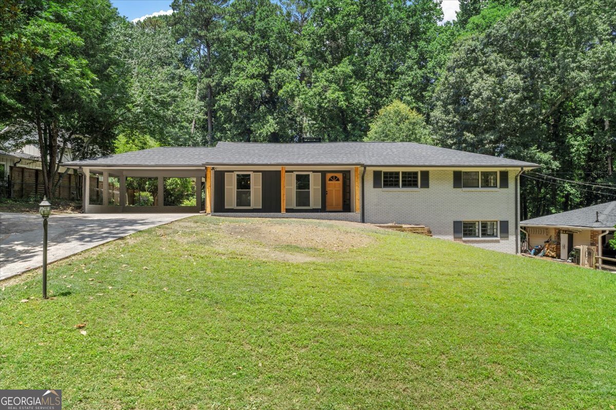 Charming Renovated Ranch in Prime Sandy Springs Location - Zoned for Heards Ferry Elementary! Welcome to this beautifully updated 4-bedroom, 3-bathroom ranch-style home over a partially finished basement, perfectly situated in one of Sandy Springs' most desirable neighborhoods. Zoned for the highly acclaimed Heards Ferry Elementary School, this move-in-ready gem offers the ideal blend of comfort, convenience, and modern upgrades. Step inside to discover a fully renovated interior featuring all-new flooring, fresh paint throughout (interior and exterior), updated light fixtures, and a brand new roof. The spacious, light-filled layout includes a completely updated kitchen with modern finishes, sleek countertops, and plenty of storage perfect for everyday living and entertaining. Enjoy the oversized sunroom, ideal for relaxing year-round, and step out onto the brand new deck overlooking a large, private backyard. Don't miss the charming "she shed," offering a versatile space for a home office, studio, or retreat. All bathrooms have been stylishly renovated with contemporary finishes. With a location just minutes from everything Sandy Springs has to offer shopping, dining, parks, and top-rated schools this home truly has it all.