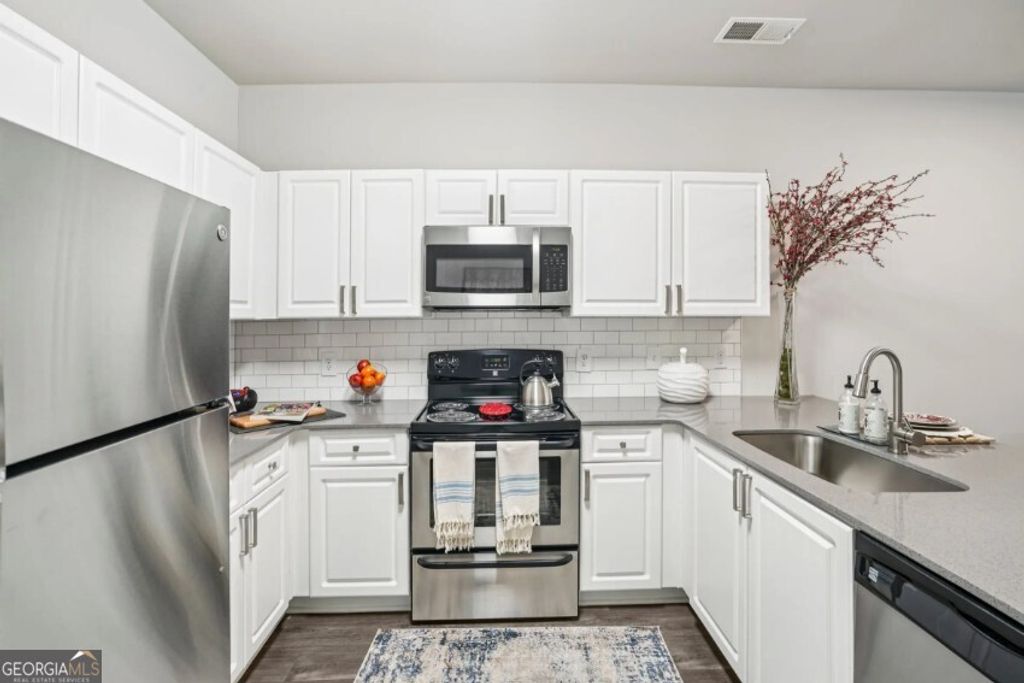 Photo of 405 Phillip Boulevard #1308, Lawrenceville, GA 30046 (MLS # 10661271)