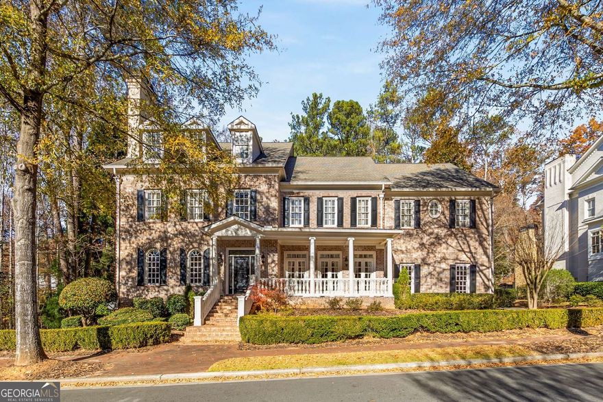 Welcome to this exquisite 6-bedroom, 6 full-bath, 2 half-bath custom home in the prestigious gated community of Ellard in Alpharetta. Residents enjoy top-tier community amenities including swim and tennis facilities, private trails, and extensive green space along the Chattahoochee River. This four-sides brick residence offers a luxurious open floor plan ideal for entertaining. The main level features a spacious primary suite with dual closets and an oversized bath, alongside a fully renovated Chef's kitchen equipped with stainless steel appliances. The kitchen opens to a breakfast area and a grand 2-story room, with formal dining and a versatile study. The upper level includes four more rooms, including a second primary, with each room enjoying its own en suite bathroom. The daylight terrace level is perfect for entertainment, featuring a gym, cinema-style movie theater, and a charming Irish pub, wine storage, plus a family room, guest suite, and craft/playroom. Outdoors, the property boasts serene double porches and a landscaped, private backyard overlooking a nature preserve. Located minutes from downtown Roswell and Alpharetta, and near the Wesleyan School, this home combines luxury with convenience in a secure setting.