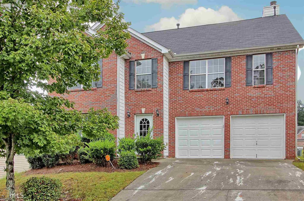 You have to come and see this updated 5 BR two-story home in Conyers, GA. The owner has just painted the interior, upgraded to solid surface countertops, added LVP waterproof flooring, and new carpet upstairs. This home feels like a brand-new house. You will enjoy the oversized great room and living room as well as the additional huge bedroom upstairs that feels like a second master.