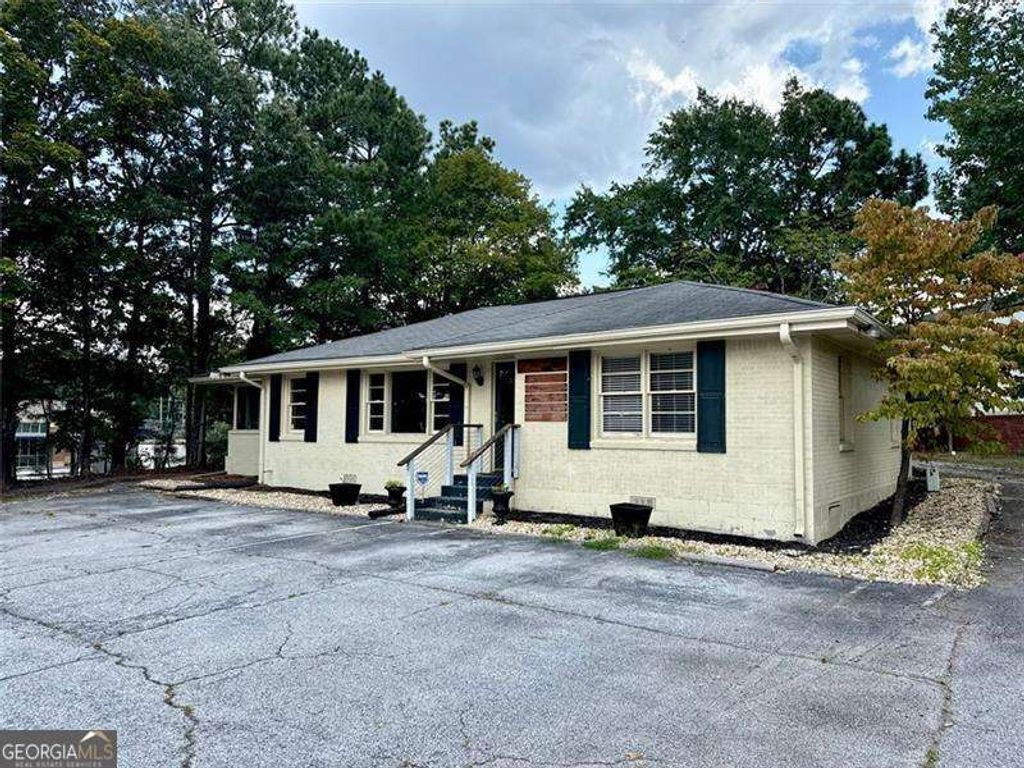 Photo of 5464 FIVE FORKS TRICKUM Road, Stone Mountain, GA 30087 (MLS # 10700104)