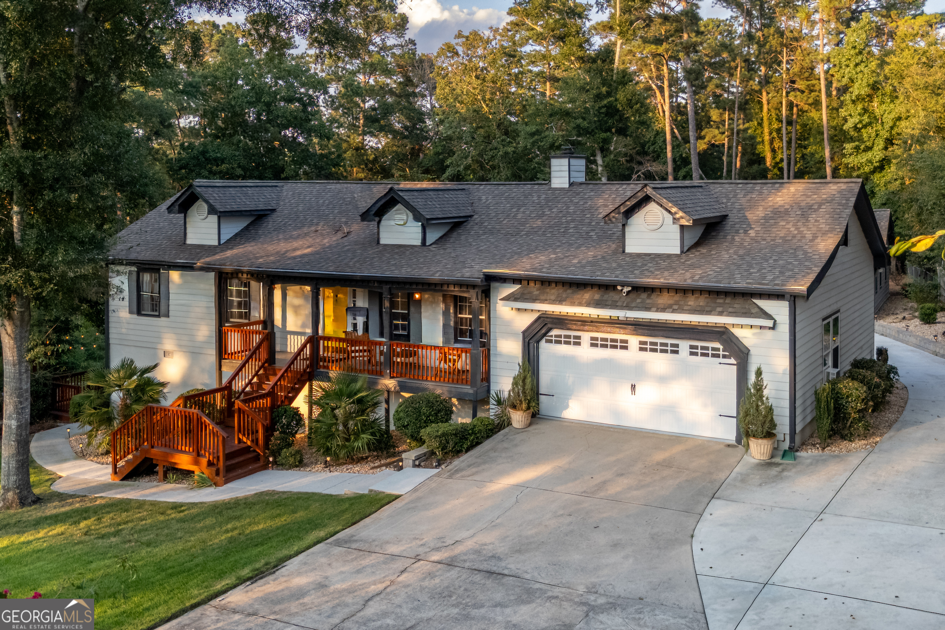 Welcome to 2390 Stone Drive! This renovated ranch offers 4 bedrooms and 2 full bathrooms, with an ADU consisting of 1 bedroom and 1 full bathroom. The primary suite is conveniently located on the main level with a carefully thought, showroom ready bathroom. The heart of the home features a beautiful kitchen island with a dining area to the side, all flowing seamlessly into the fireside living room. The open floor plan has been complemented by a full renovation in 2022 consisting of brand new LVP flooring, fresh paint, and stylish updates throughout, including new backsplash, appliances, roof, septic system, and countertops. A separate dining room, open porch, and bright living spaces make this home perfect for everyday living or entertaining. This house includes a walkout basement that provides even more space and flexibility. This property offers a unique opportunity to live in one unit and rent out the other - let the rental income help offset your mortgage and reduce your monthly expenses. Additional highlights include a flat driveway, automatic garage, and a prime location near Stone Mountain Park, Hwy. 78, and I-285. If you're interested, don't wait-schedule a showing today and see firsthand what this home has to offer!