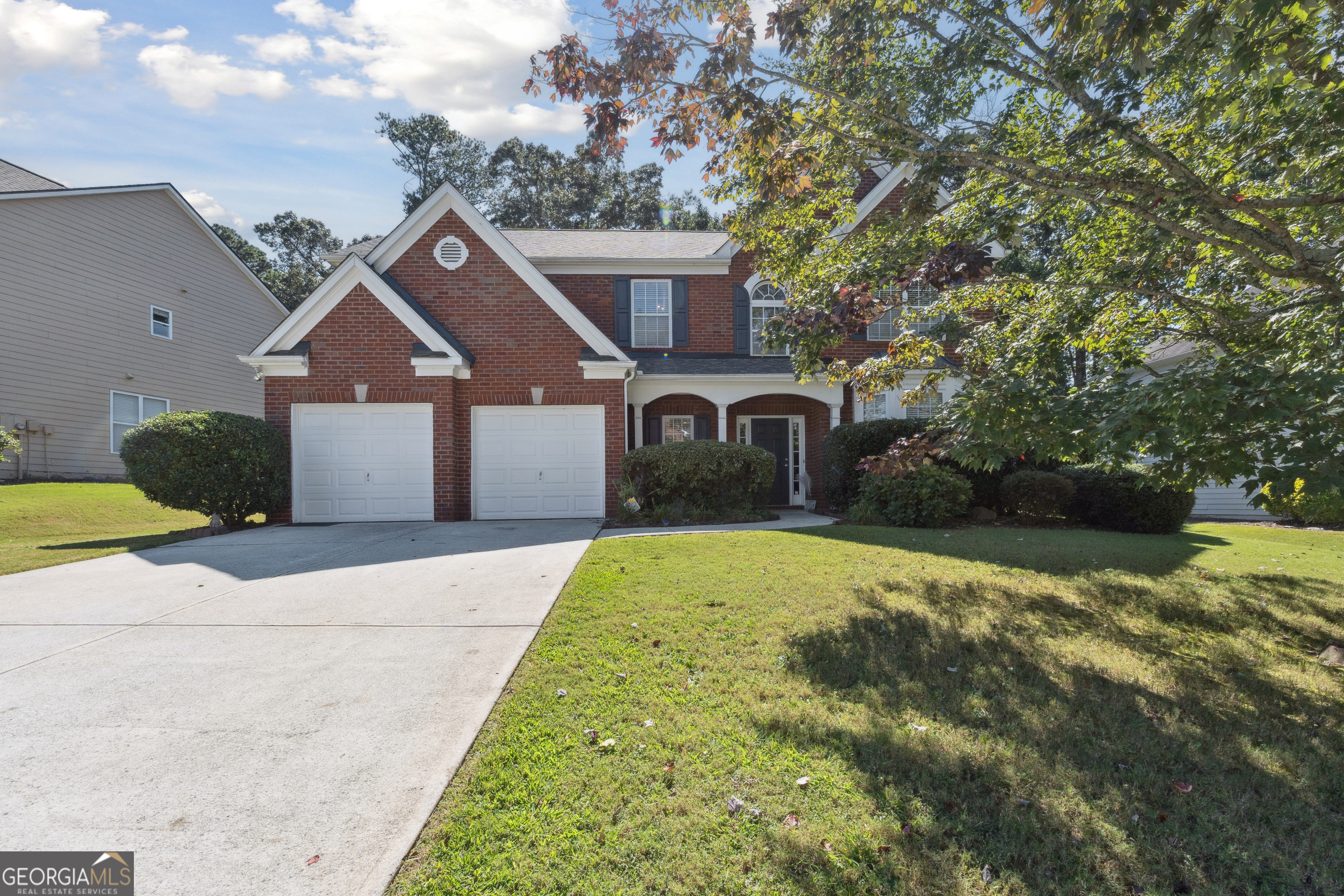 *SELLER OFFERING $15,000 FLOORING AND PAINT ALLOWANCE WITH FULL PRICE OFFER* This spacious 4-bedroom, 2.5 bath home is located in the highly coveted Daniel Park neighborhood. Located within a highly desired school system, this home is just minutes from I-85, the Mall of Georgia and the coveted Hamilton Mill area. The kitchen offers a practical open layout with plenty of cabinets and a large pantry for extra storage. There is easy access to the formal dining room and an eat-in nook perfect for casual and relaxed meals. When entering the main living area, you can't help but notice the impressive cathedral ceilings. The additional windows in the room allow for plenty of natural light to flood the space The open and airy staircase leads you up to 4 bedrooms that are thoughtfully laid out. The primary suite features vaulted ceilings, a double vanity, soaking tub, separate glass enclosed shower and a walk-in closet. The remaining 3 bedrooms share a conveniently located hall bathroom. You will also enjoy the ultimate convenience of an upstairs laundry room for ease of use! Your private backyard is fully fenced and the natural trees surrounding the area give it a peaceful and wooded feeling. As part of this desirable community, the HOA provides access to the swimming pool, tennis courts, a playground and a small lake. You can also enjoy a nice walk or bike ride on the well-maintained sidewalks throughout the neighborhood. In addition to these amenities, you will be invited to join in events that create a "community hub" to foster friendships and connect with neighbors. With a brand new water heater and brand new main level HVAC unit, this property is ready to become your next home. Schedule a showing today!